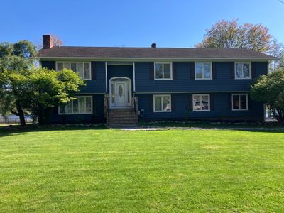 Siding Transformation with Cert Cedar Impressions, D/7 Perfection Straight Bottom, Pacific Blue and Cert Mainstreet D/4 Clapboard, Pacific Blue