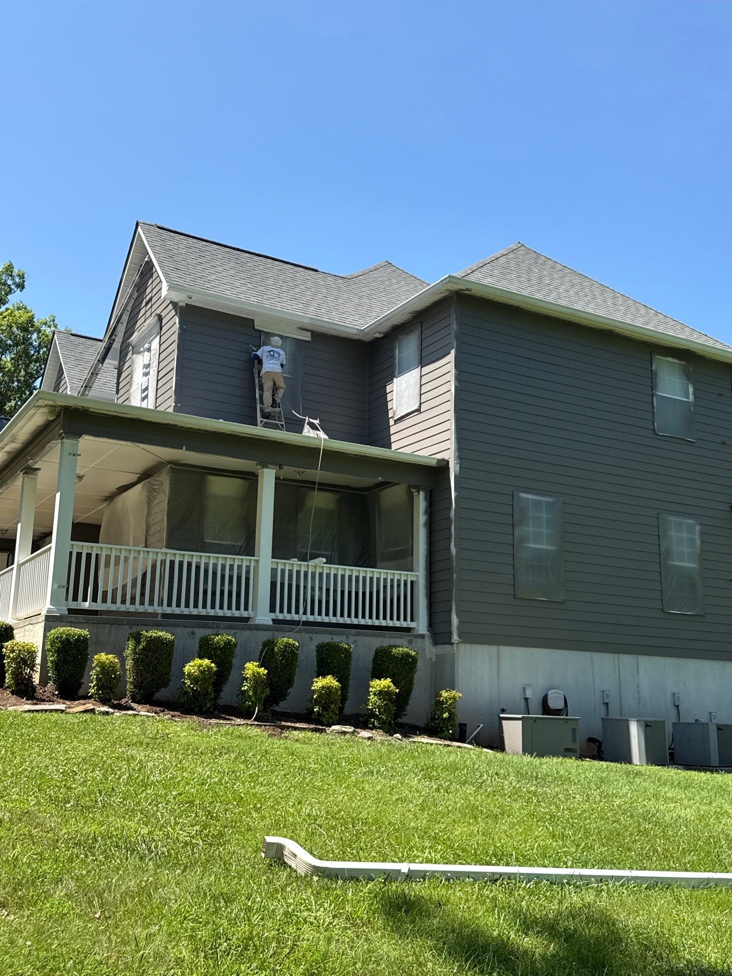 Siding replacement, exterior painting, and front door staining. by GonzalezPainters & Contractors Inc