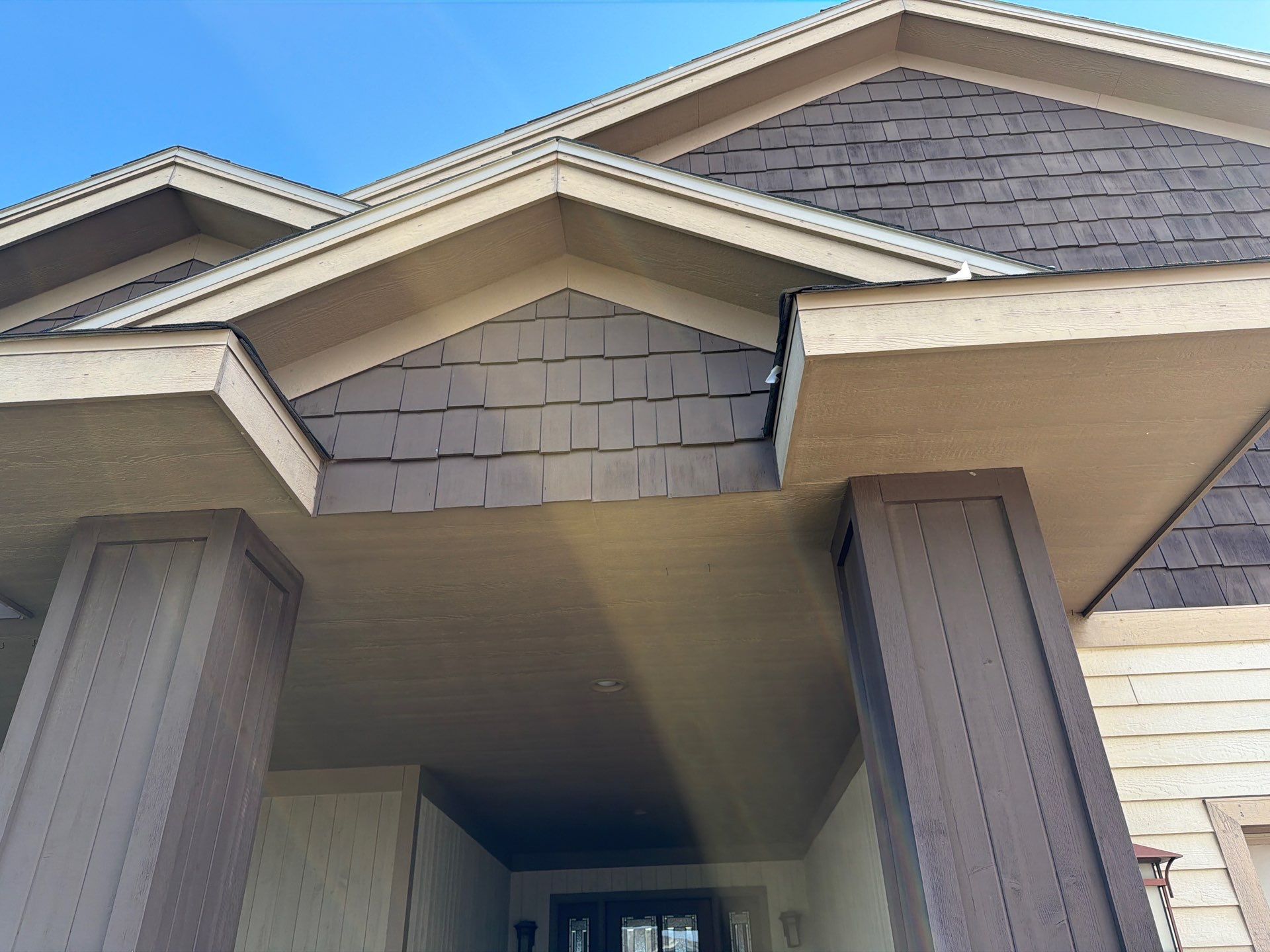 Sioux Falls Exterior Refresh and Multi-Level Deck Maintenance by Select Painting, Coatings & Garage Cabinets
