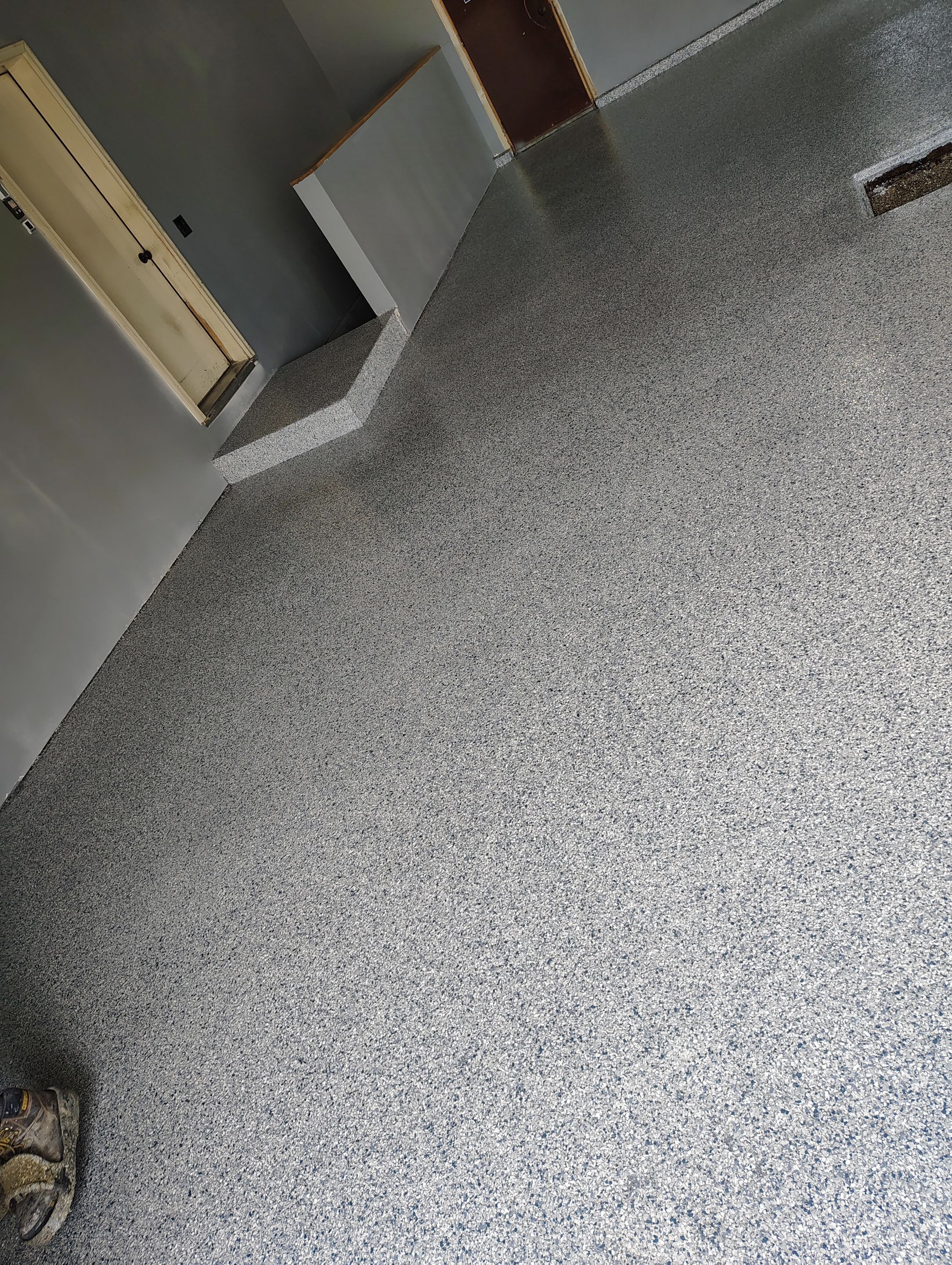 Garage Floor Concrete Coating and Surface Restoration in Colman by Select Painting, Coatings & Garage Cabinets