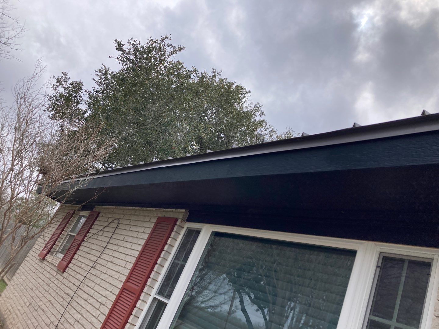 Beeville Backporch sittin' by Bayfront Roofing and Construction