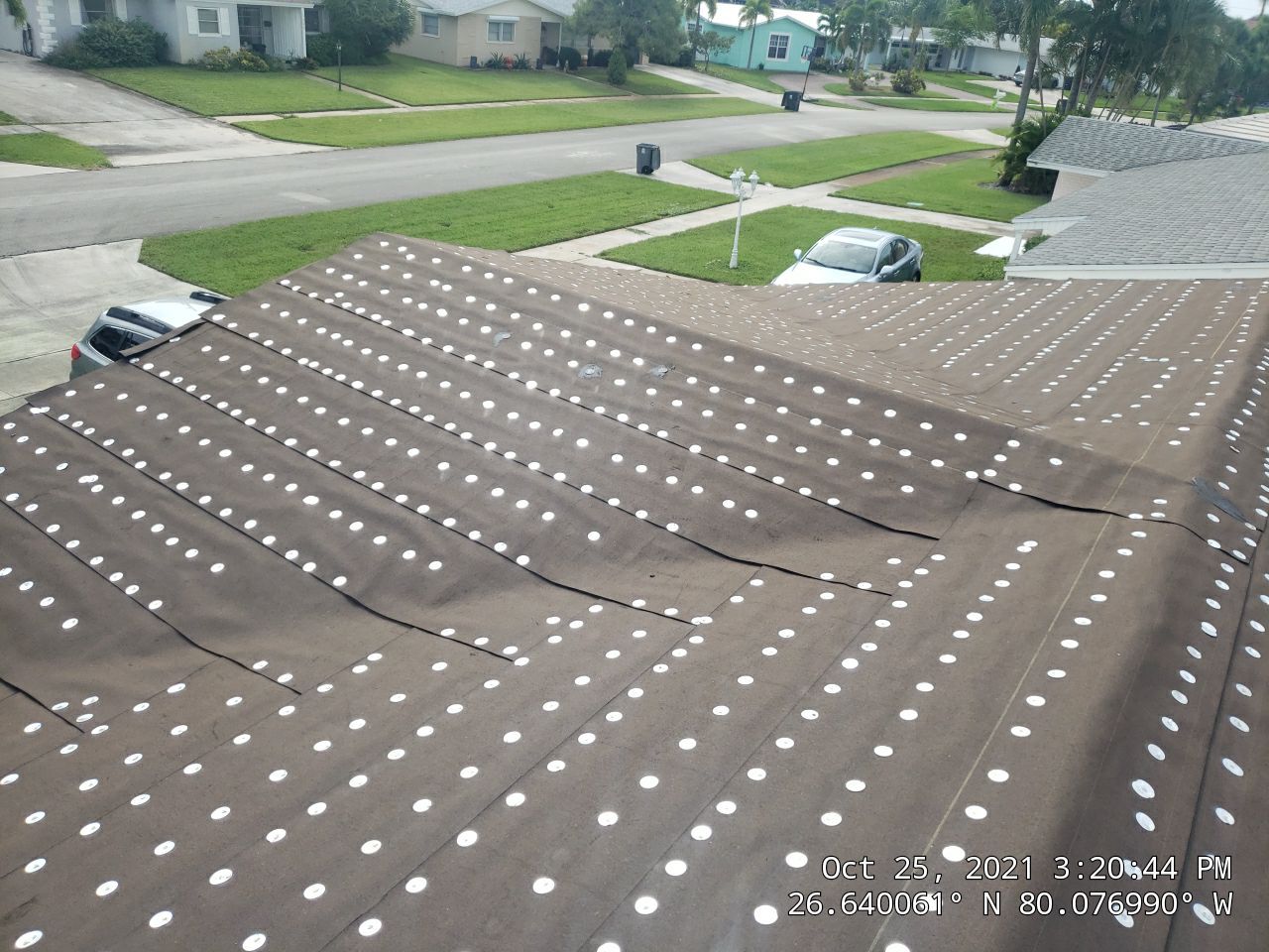Residential Roofing Installation using 1" Nail strip metal roof by BLUES BROTHERS ROOFING