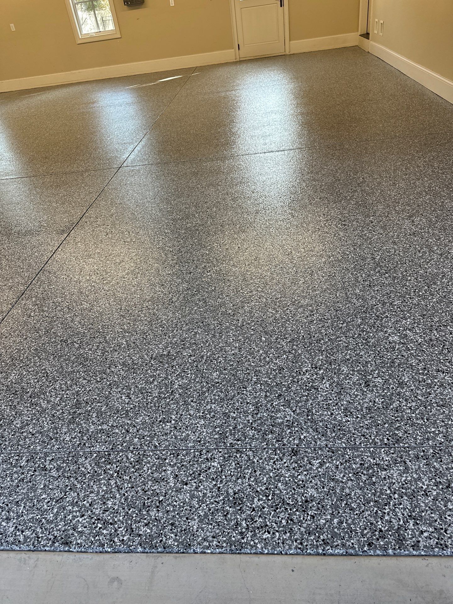 Garage Floor Coating using Wombat by My Garage Floor Guys