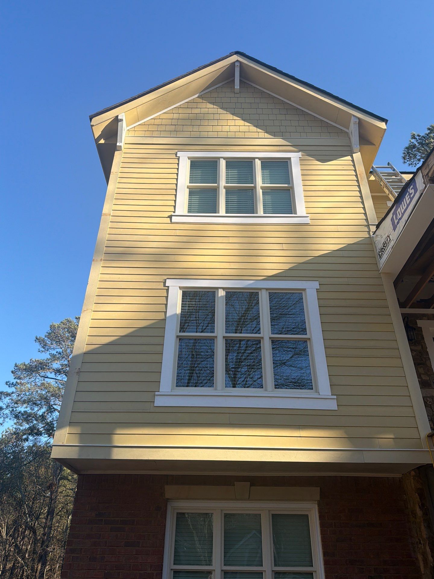 James Hardie Siding Replacement, Exterior Painting, Deck Stain, and Gutter Installation in Peachtree Corners, GA by Nelson Exteriors