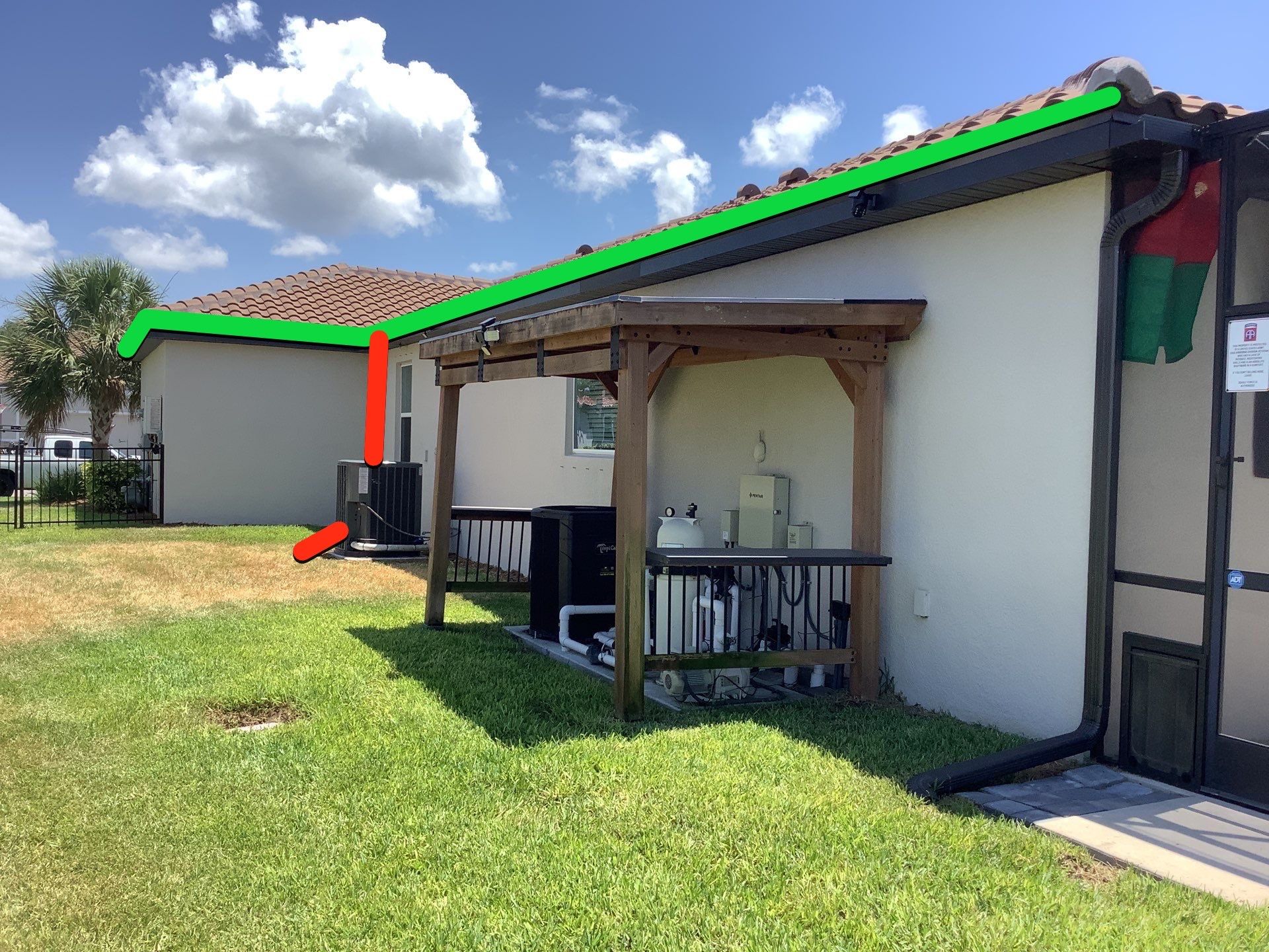Musket brown seamless gutters with splash guards, new downspouts, and extensions in Bradenton, FL by Gutter Professors