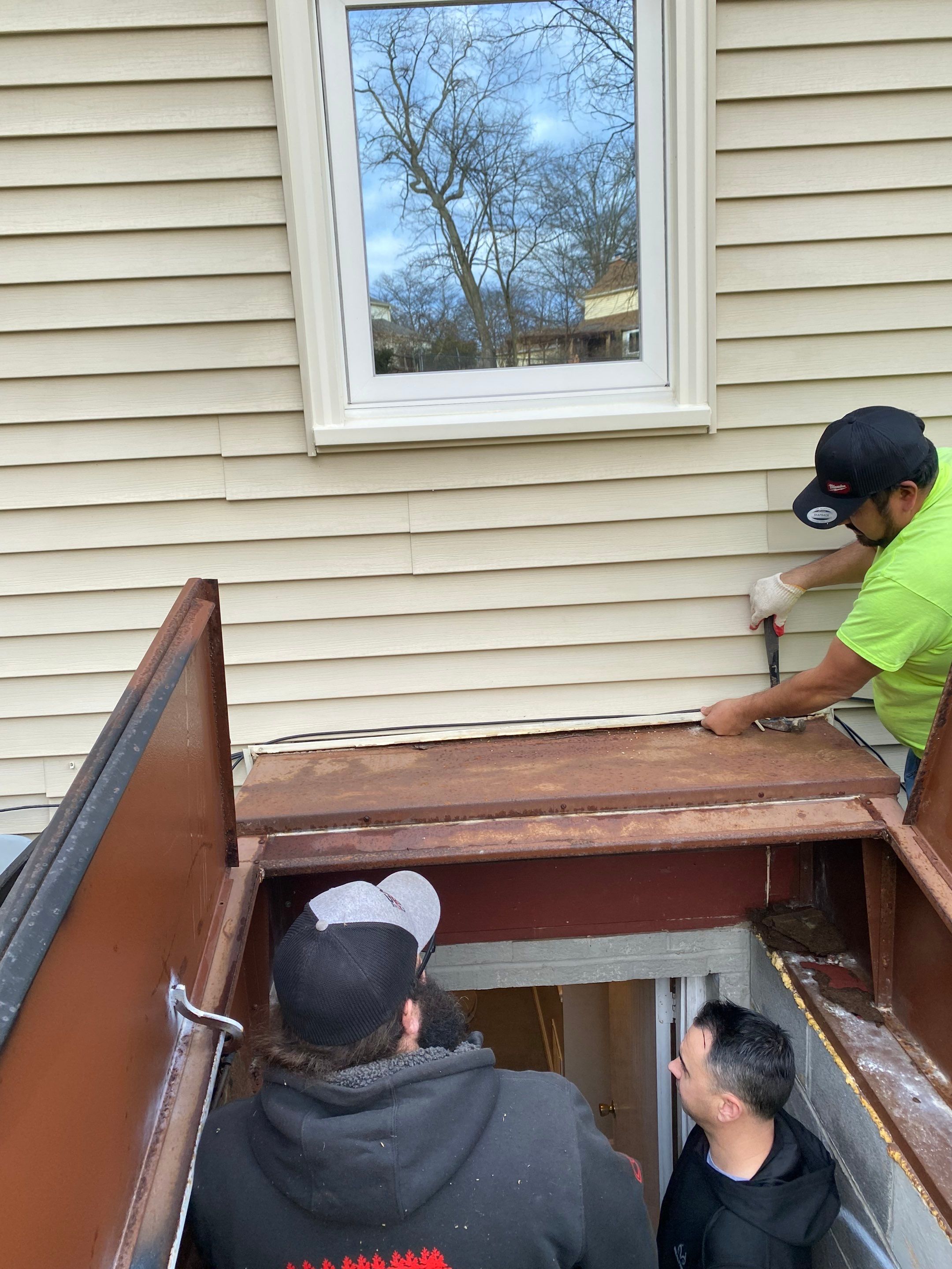 New Bilco doors to basement & new front porch posts by The Smet Companies, LLC