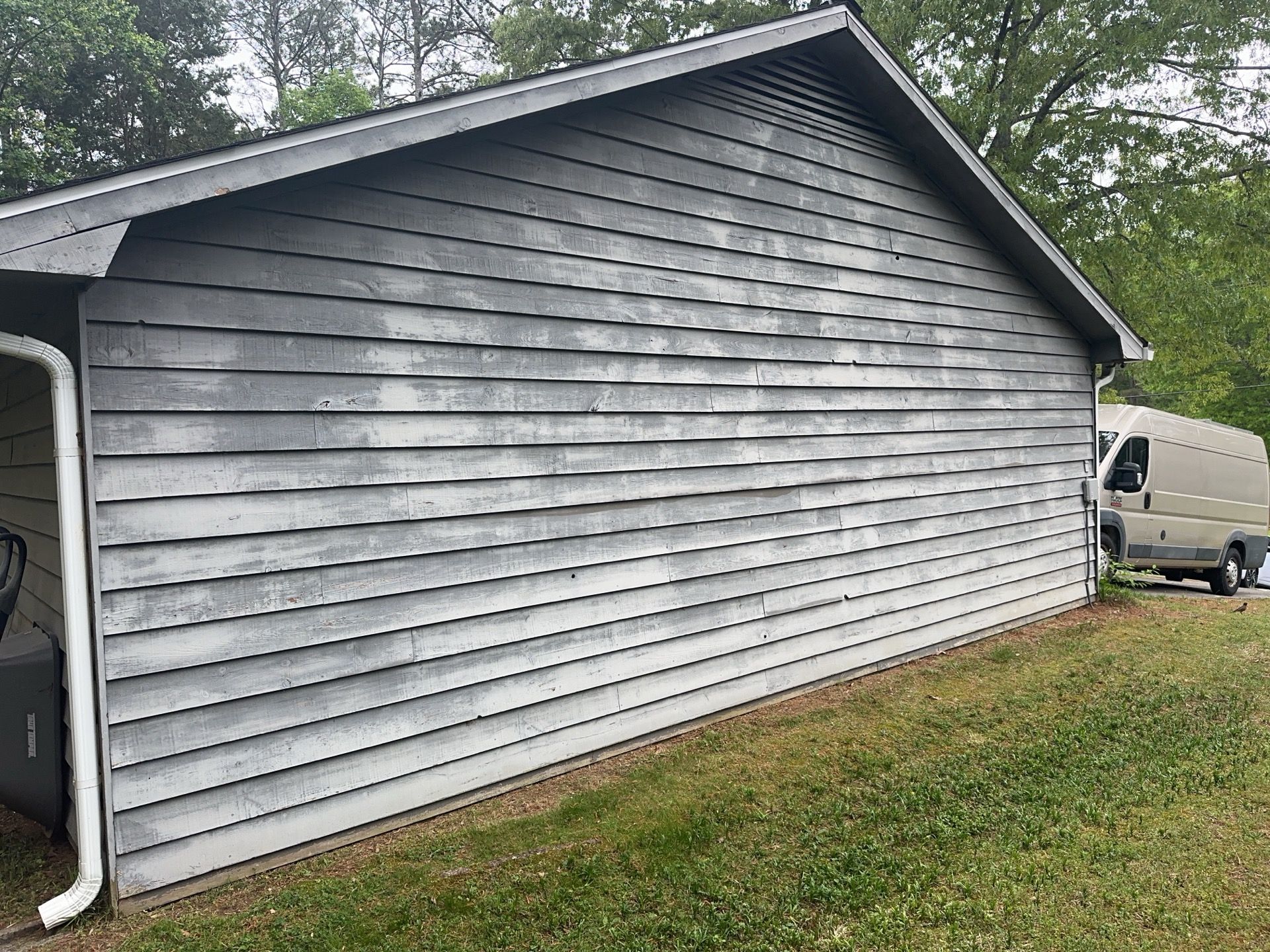 Marietta, GA Exterior Painting Transformation with Blue Paint by Nelson Exteriors