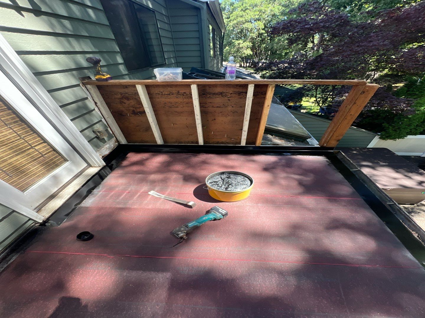 Residential Deck Replacement  using Certainteed Flintlastic SA Cap by Orezona Building & Roofing Company, Inc.