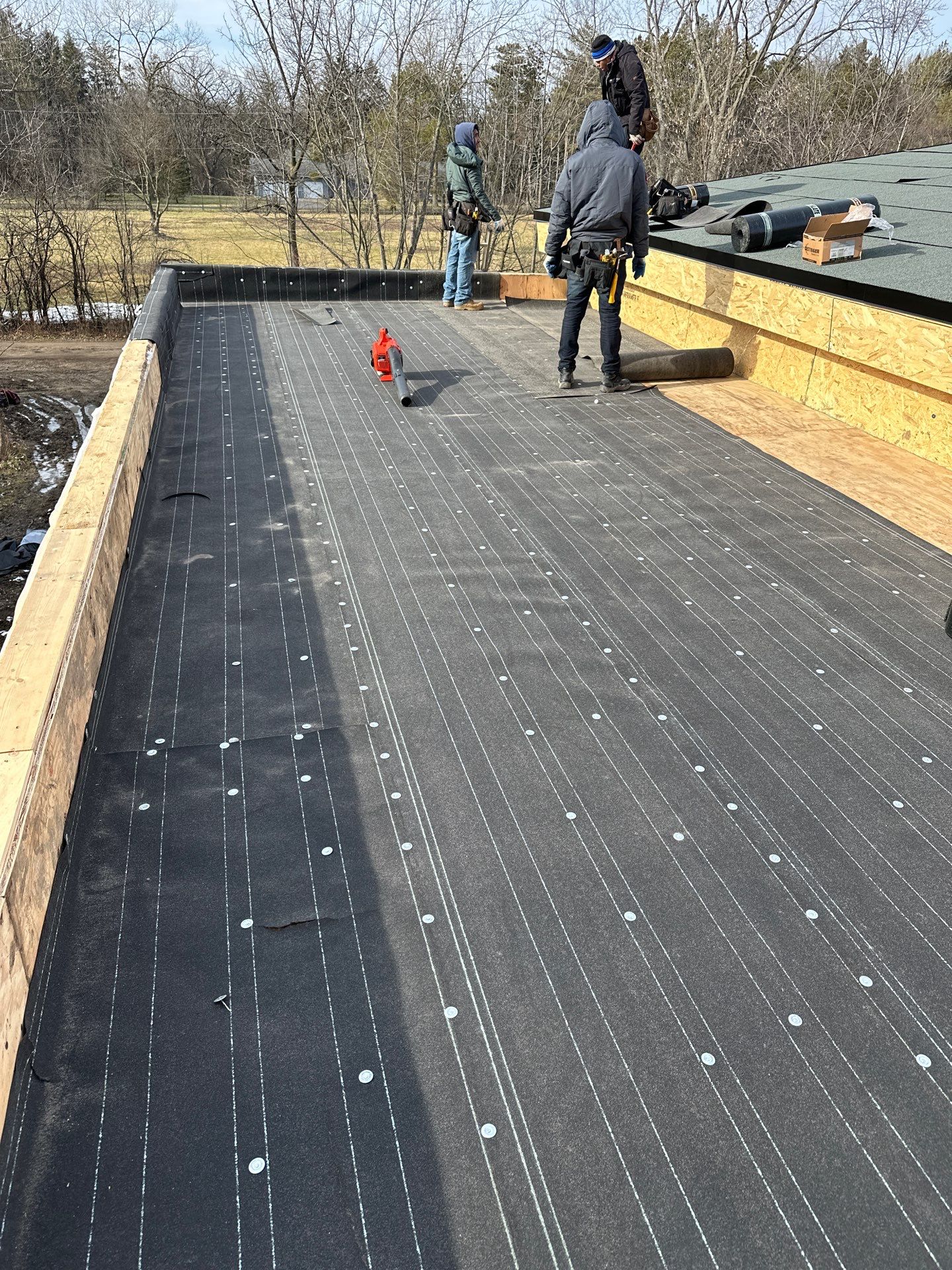 Residential Roofing Installation using Flat Roofing  by Perfect Exteriors Inc. 