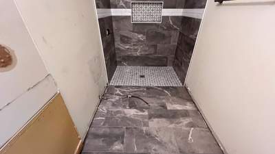 Tub to a curbless walk-in shower