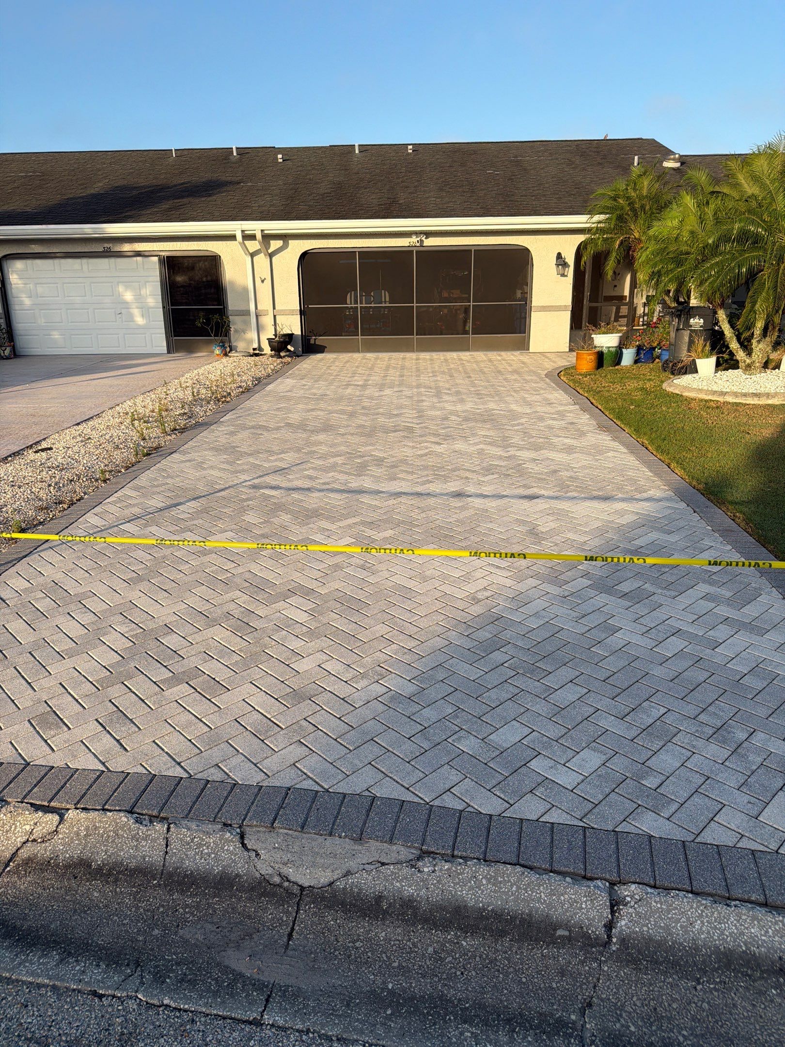 Paver Sealing and Cleaning for Herringbone Driveway in Sun City Center by Supreme Paver Experts