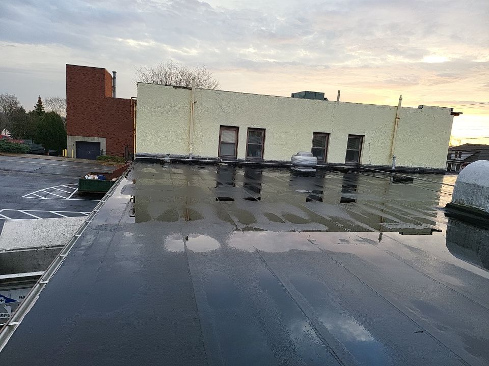 Commercial Roofing Installation using EPDM  by A Plus Exterior