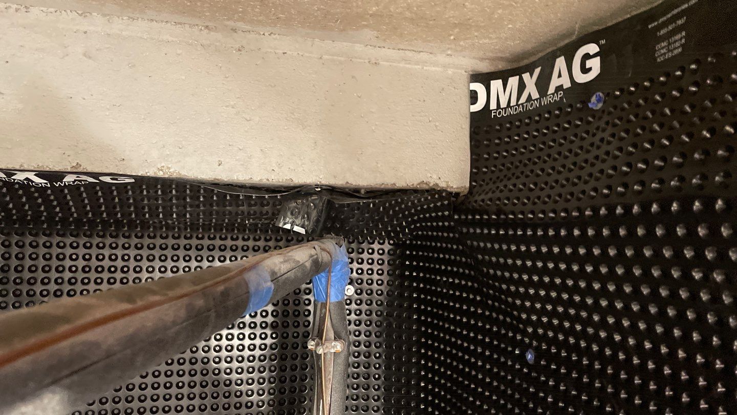 Interior Drain Tile & Sump Pump System in West Minneapolis by Waterproofing Northeast