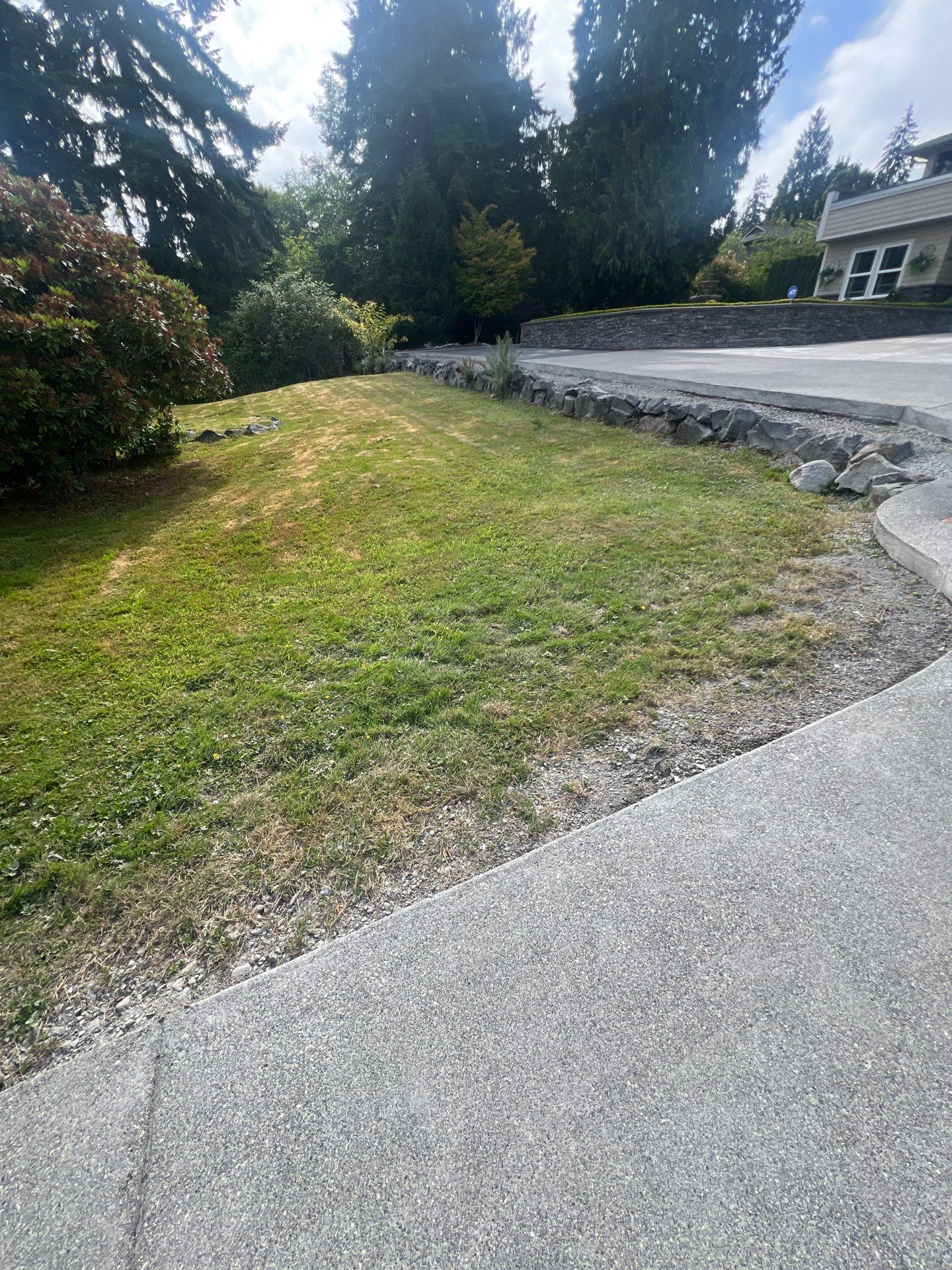 Concrete Driveway Makeover w/ Asphalt Patch | Everett  by Jireh Asphalt & Concrete Inc 