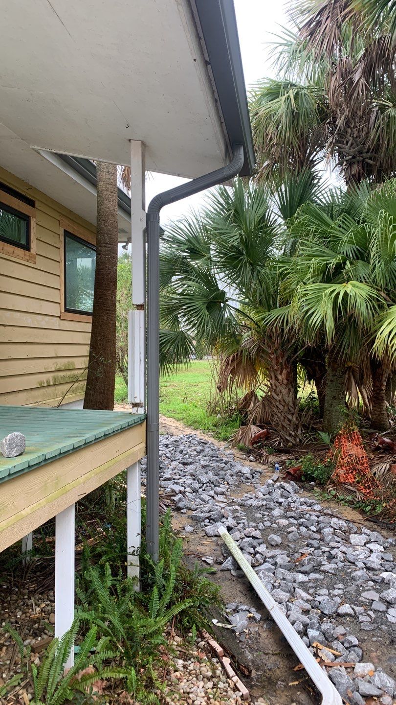 Seamless Gutter Installation using Charcoal Grey Gutters by Gutter Professors