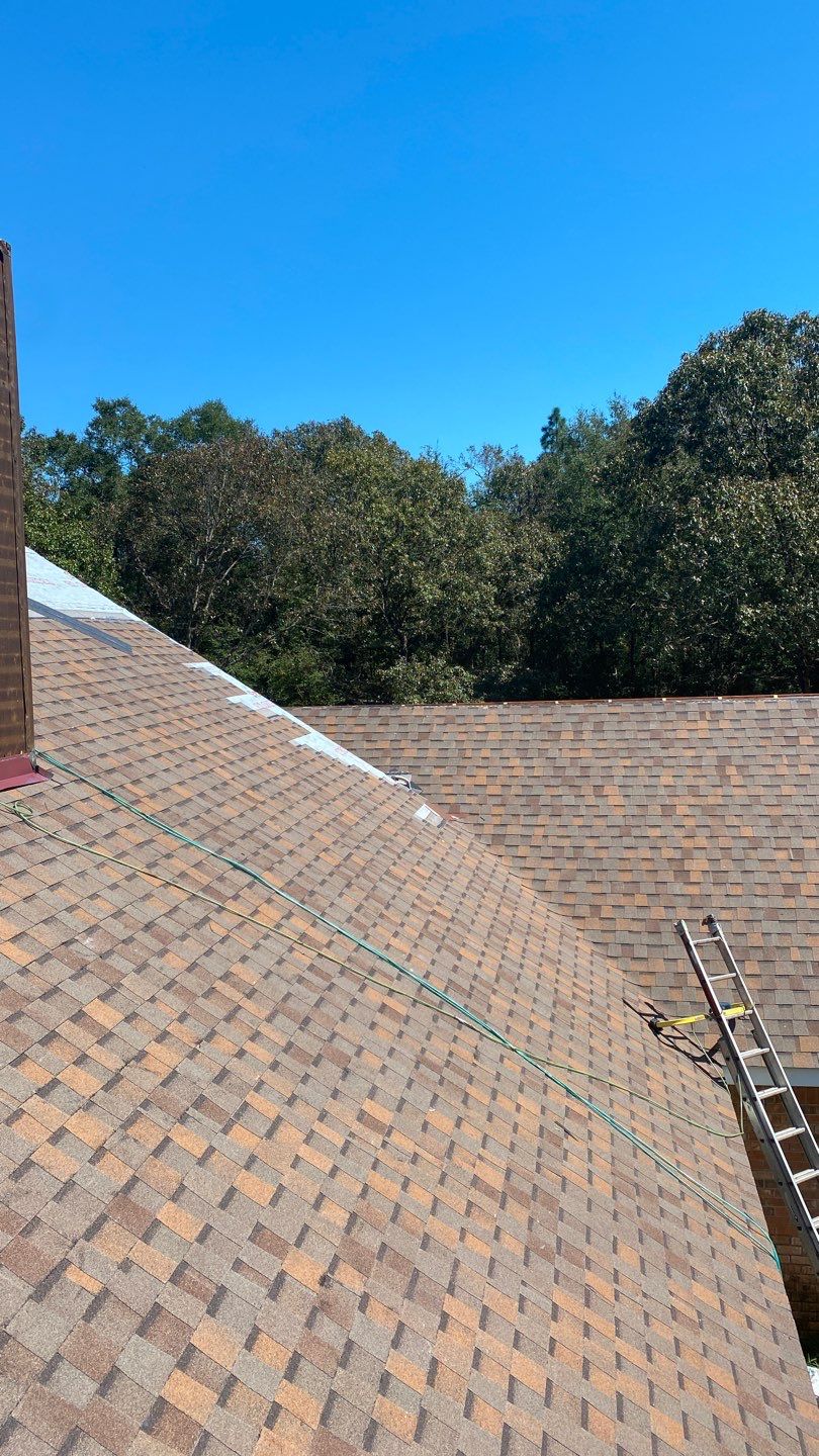 Residential Roofing Installation using Roof Replacement by American Roofing & Construction LLC