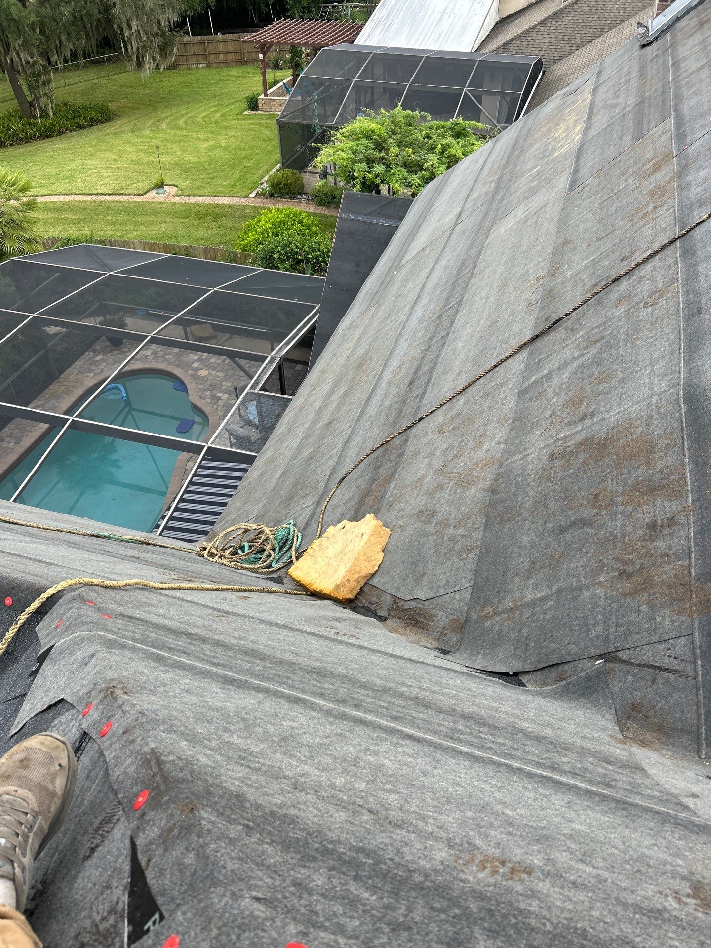 Residential Roofing Installation with Black Shadow Shingles in Clermont by Pinnacle Roofing Group