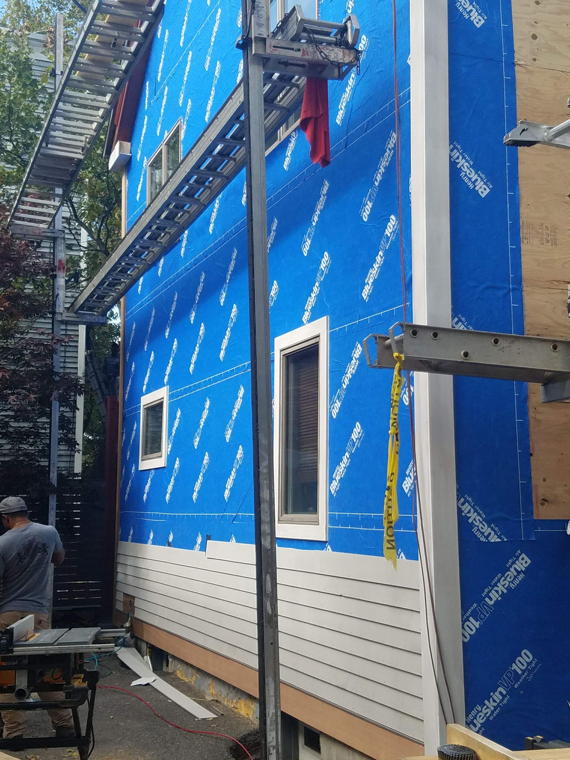 Siding Installation using Cedar Clapboard by Loyalty Exterior Solutions 