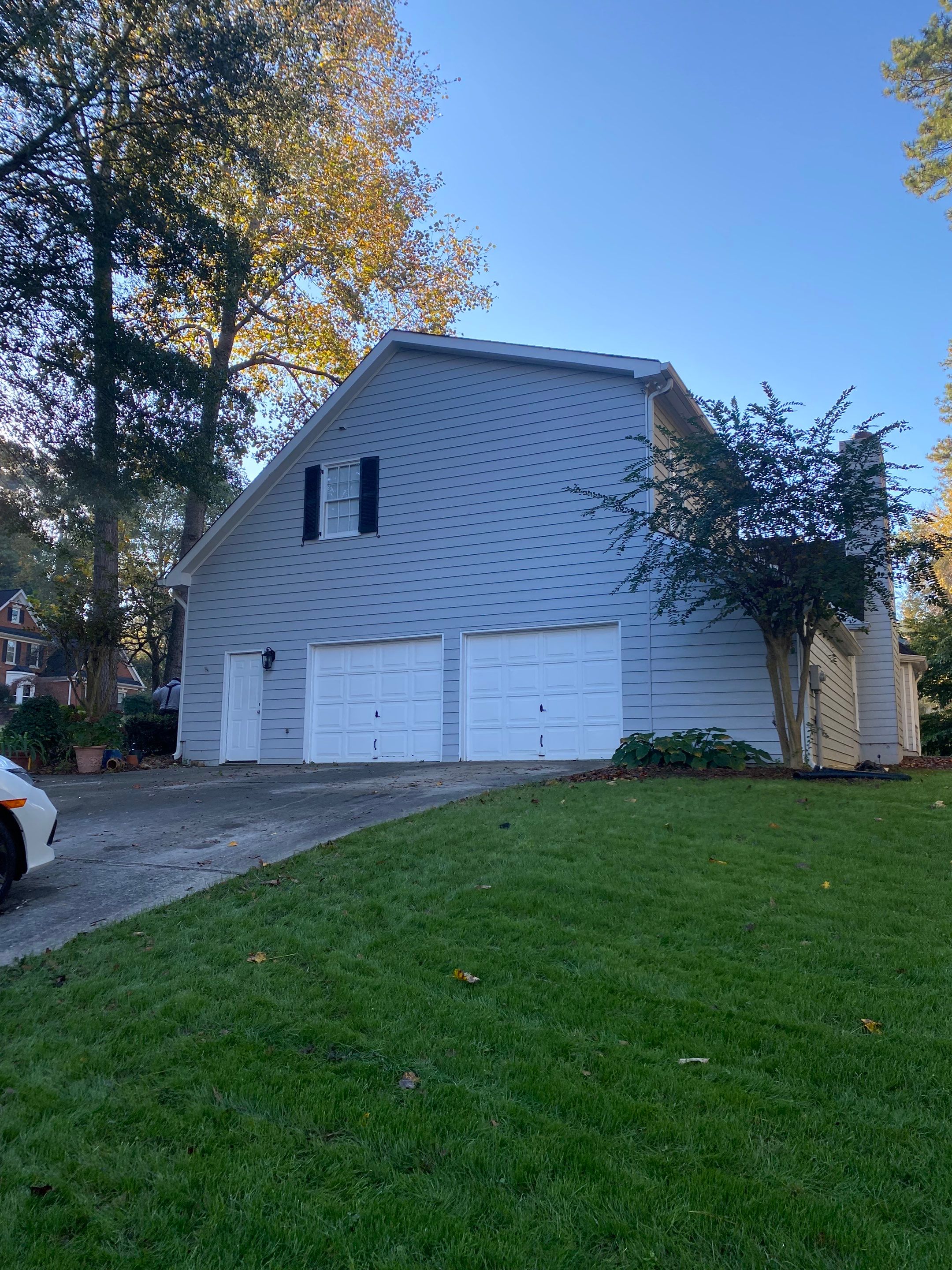 Full Exterior Home and Detached Garage Painting in Kennesaw by Swift Home Renovations 