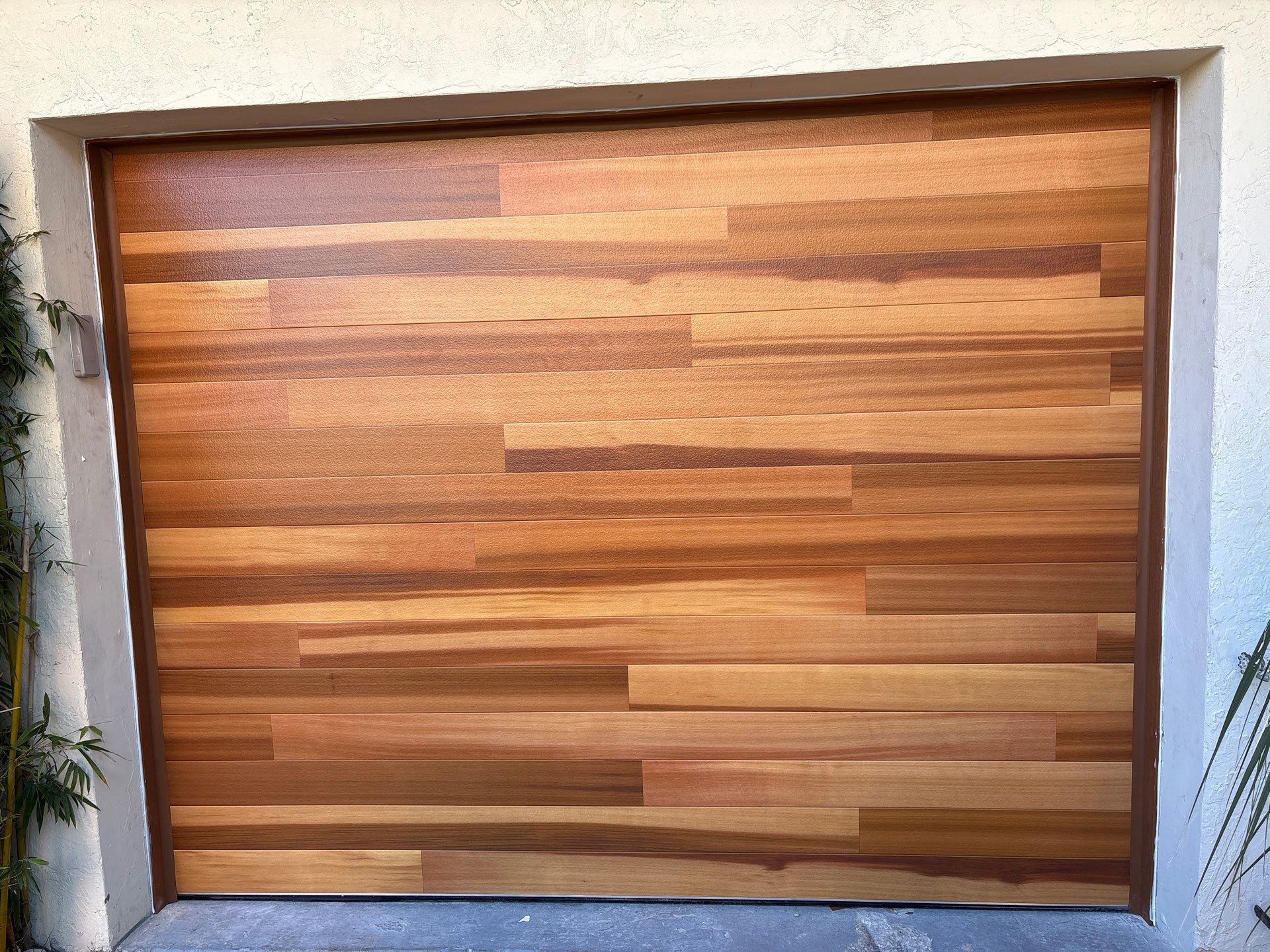 Clopay Modern Steel Garage Door Installation in Fort Lauderdale by The Door Doctor of South Florida, Inc.