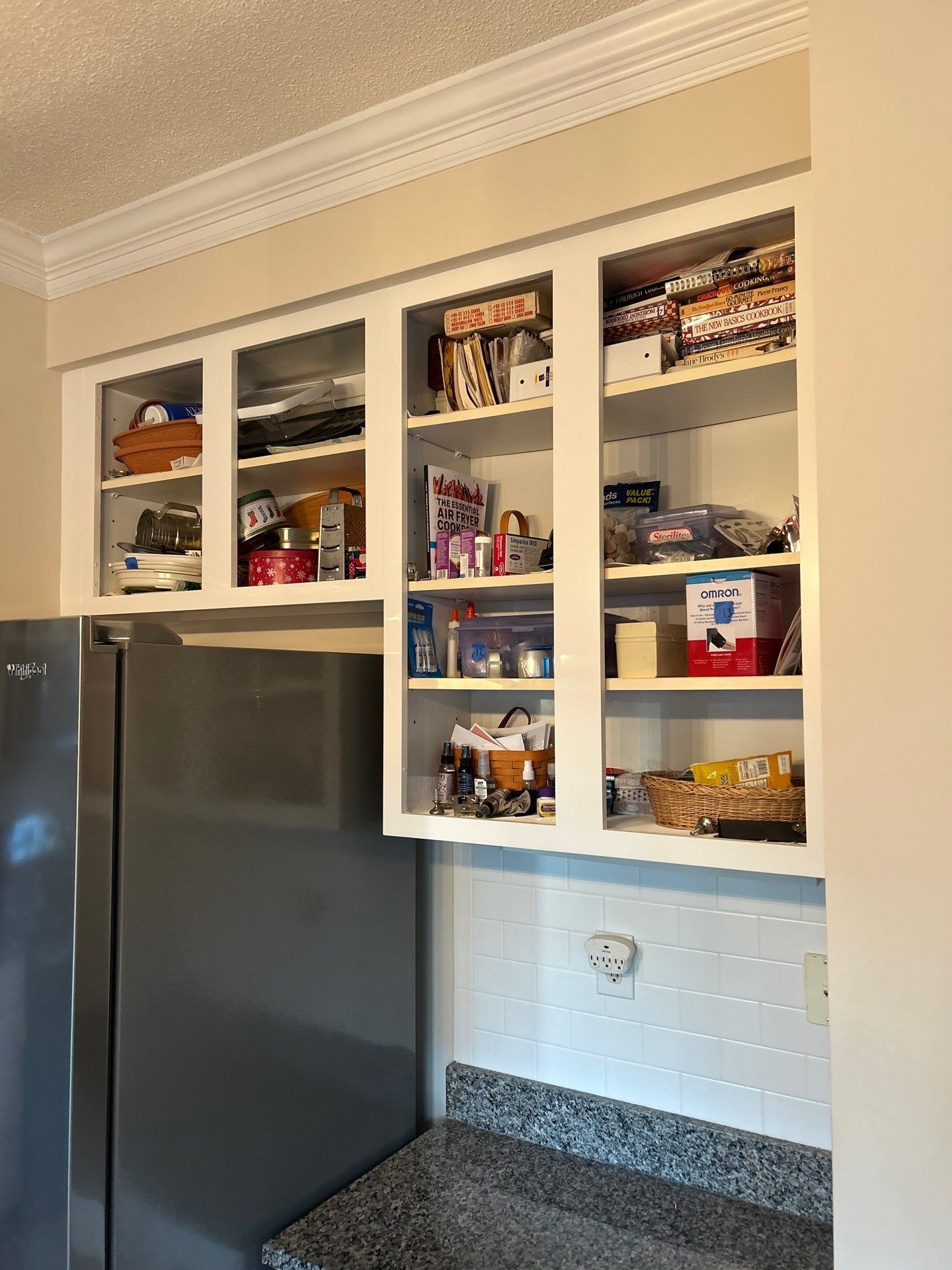 Cabinet painting by GonzalezPainters & Contractors Inc 