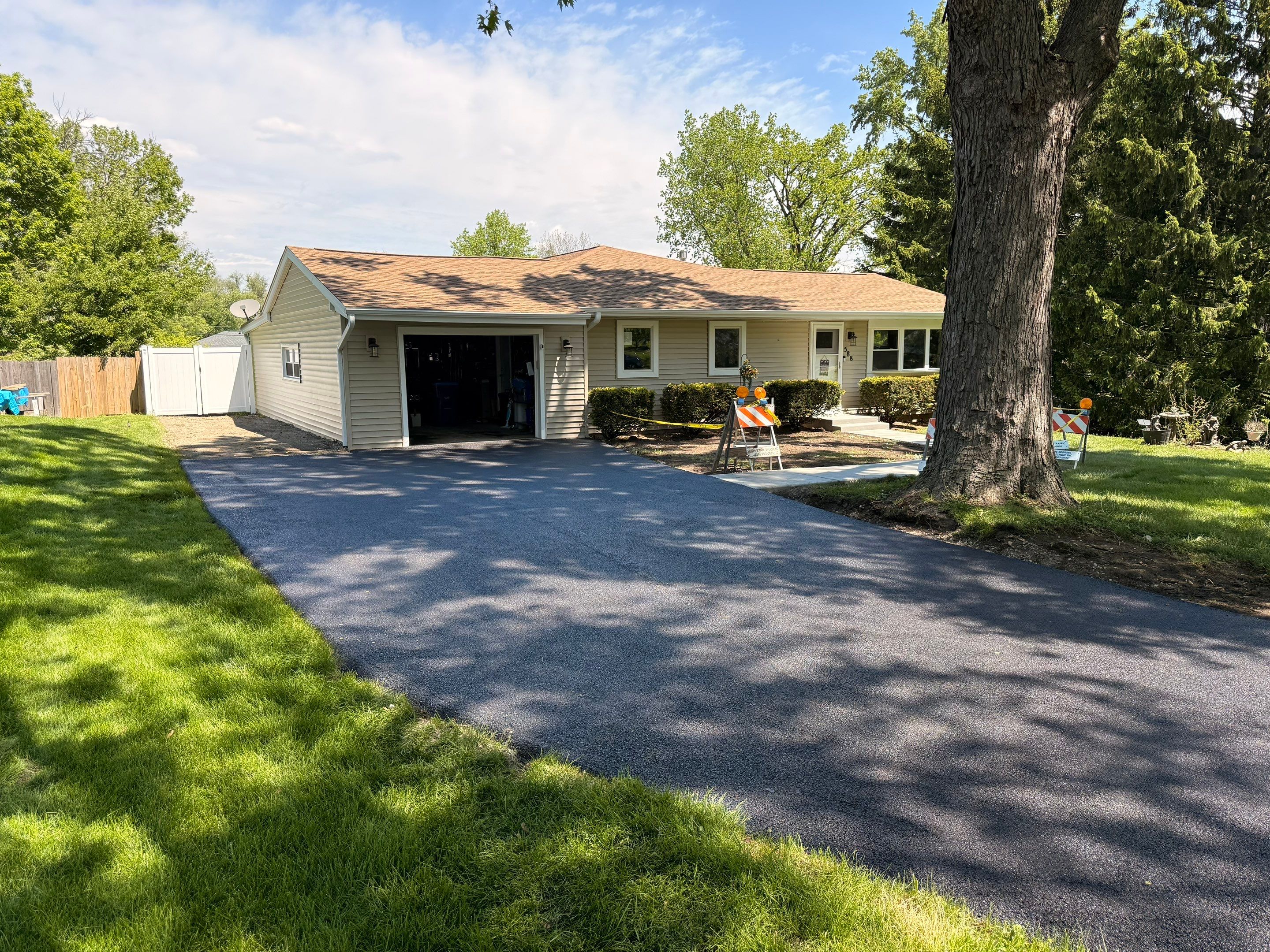 full asphalt driveway replacement by PaveRight Concrete&Asphalt LLC