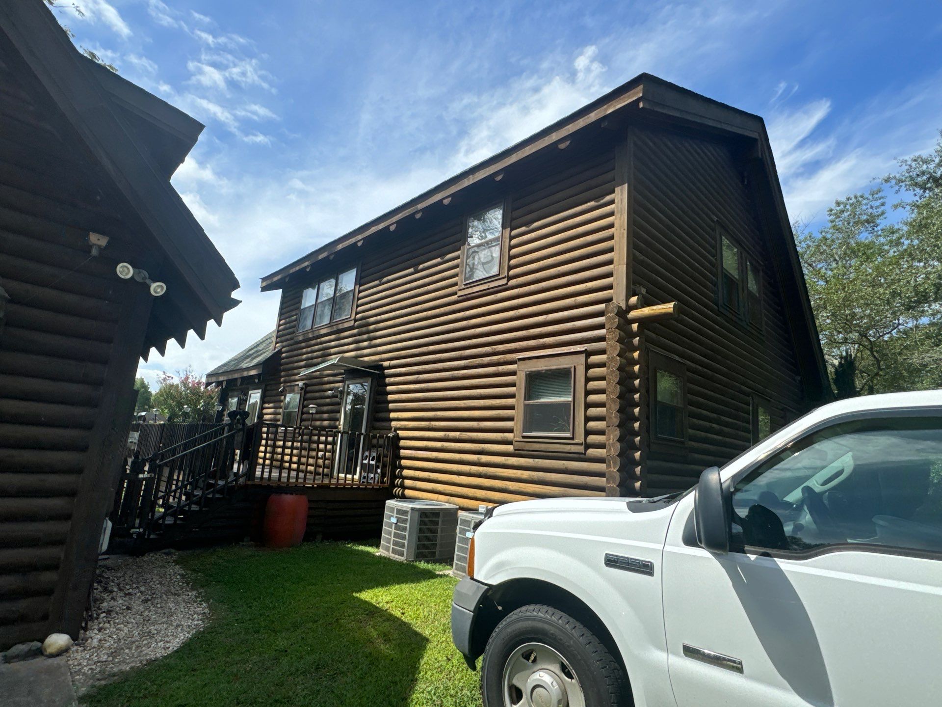 Smithfield Log Cabin by AKK Painting LLC