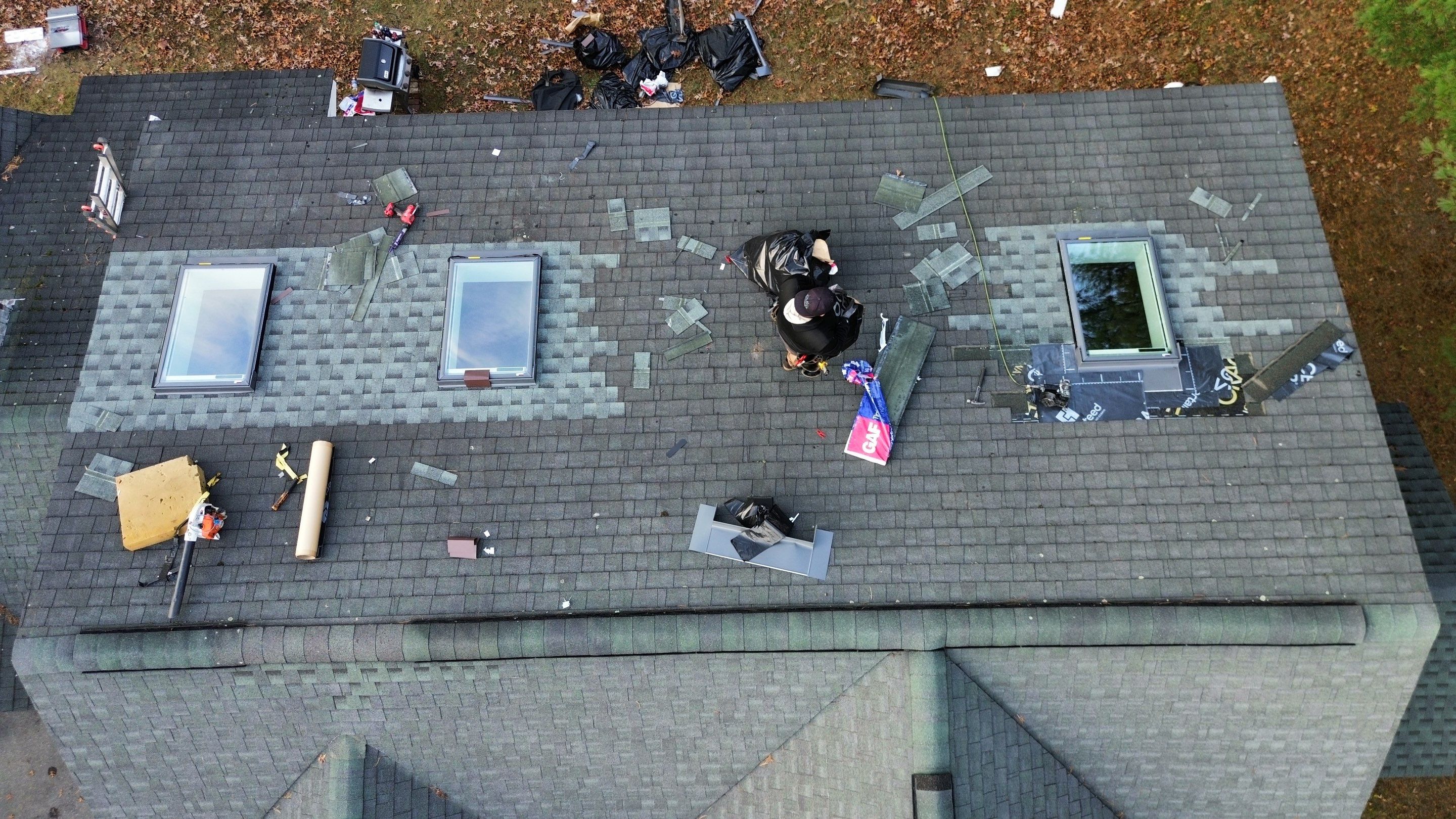 Chelmsford Triple Skylight Leak Repair with Fascia & Shingle Restoration by Mighty Dog Roofing of Greater Middlesex County