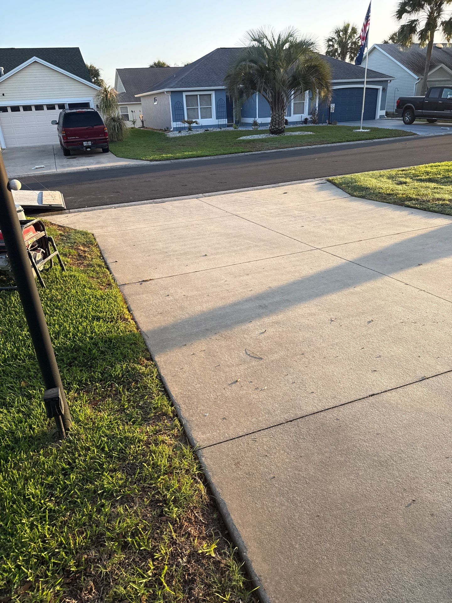 Driveway Tidal Wave with Cool Breeze Border and Sidewalk by Innovative Concrete Coatings 