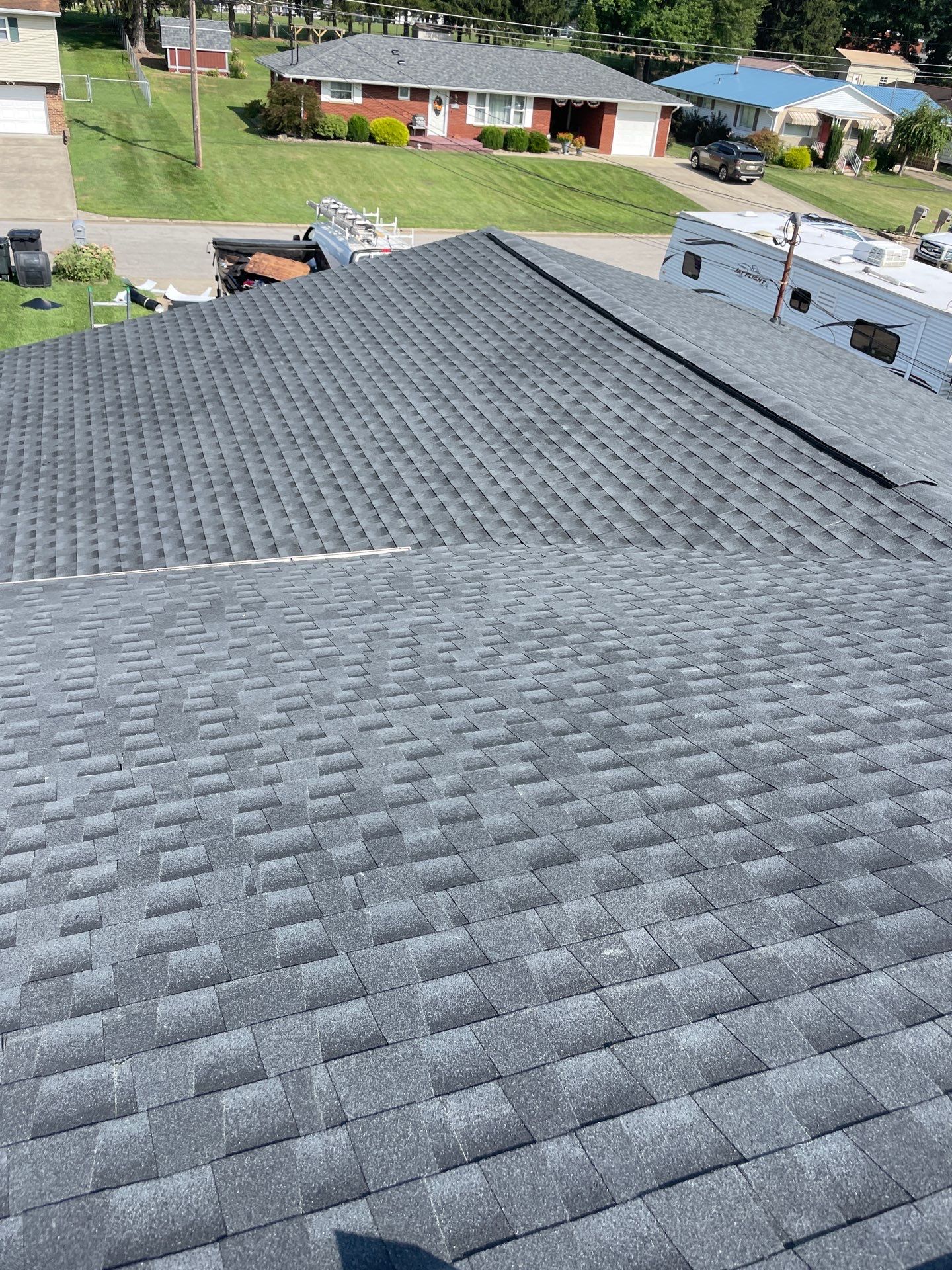Residential Roofing Installation using GAF Timberline HDZ Charcoal by Rainstoppers Roofing