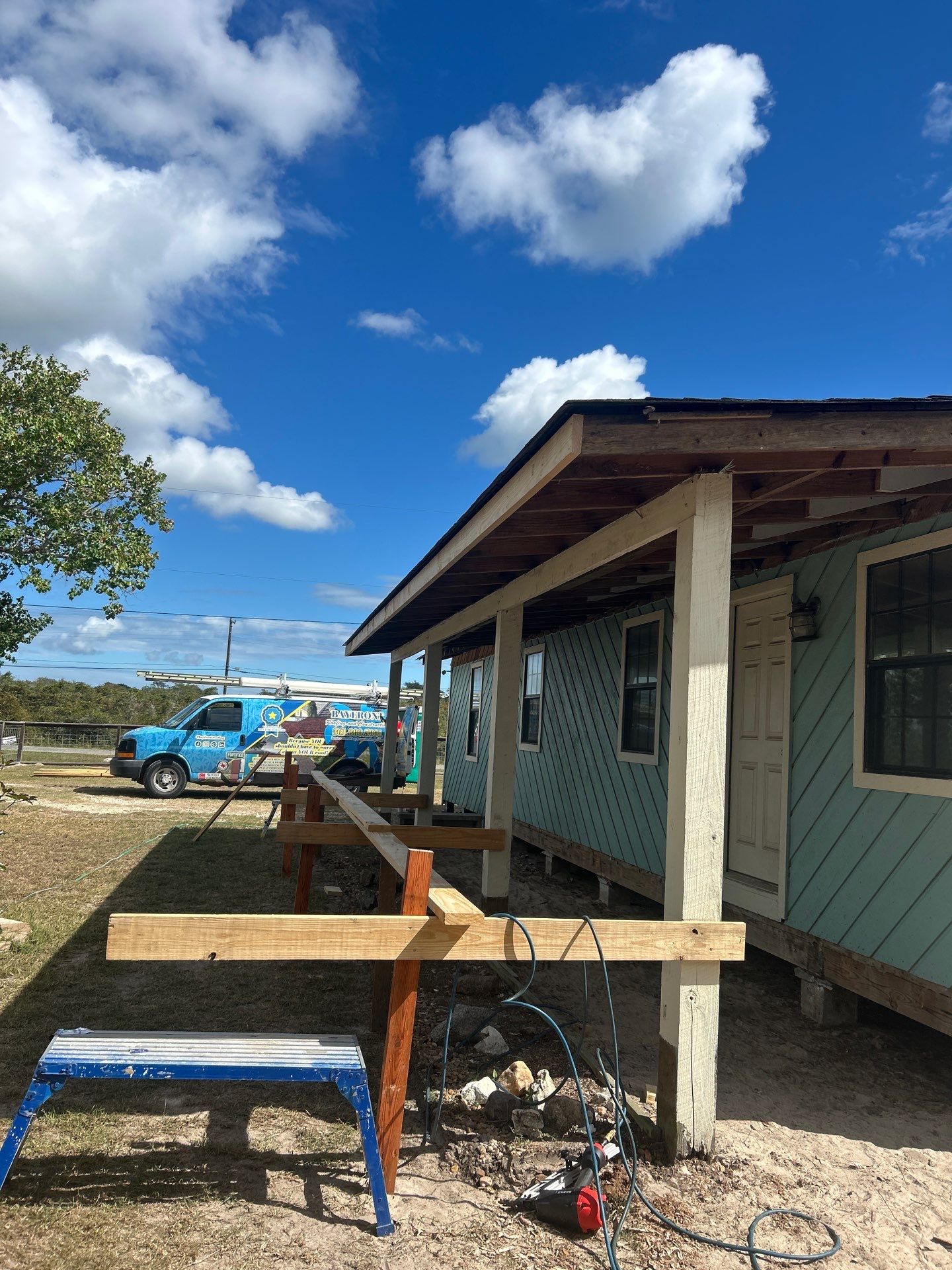 Patio? We got you Covered! by Bayfront Roofing and Construction
