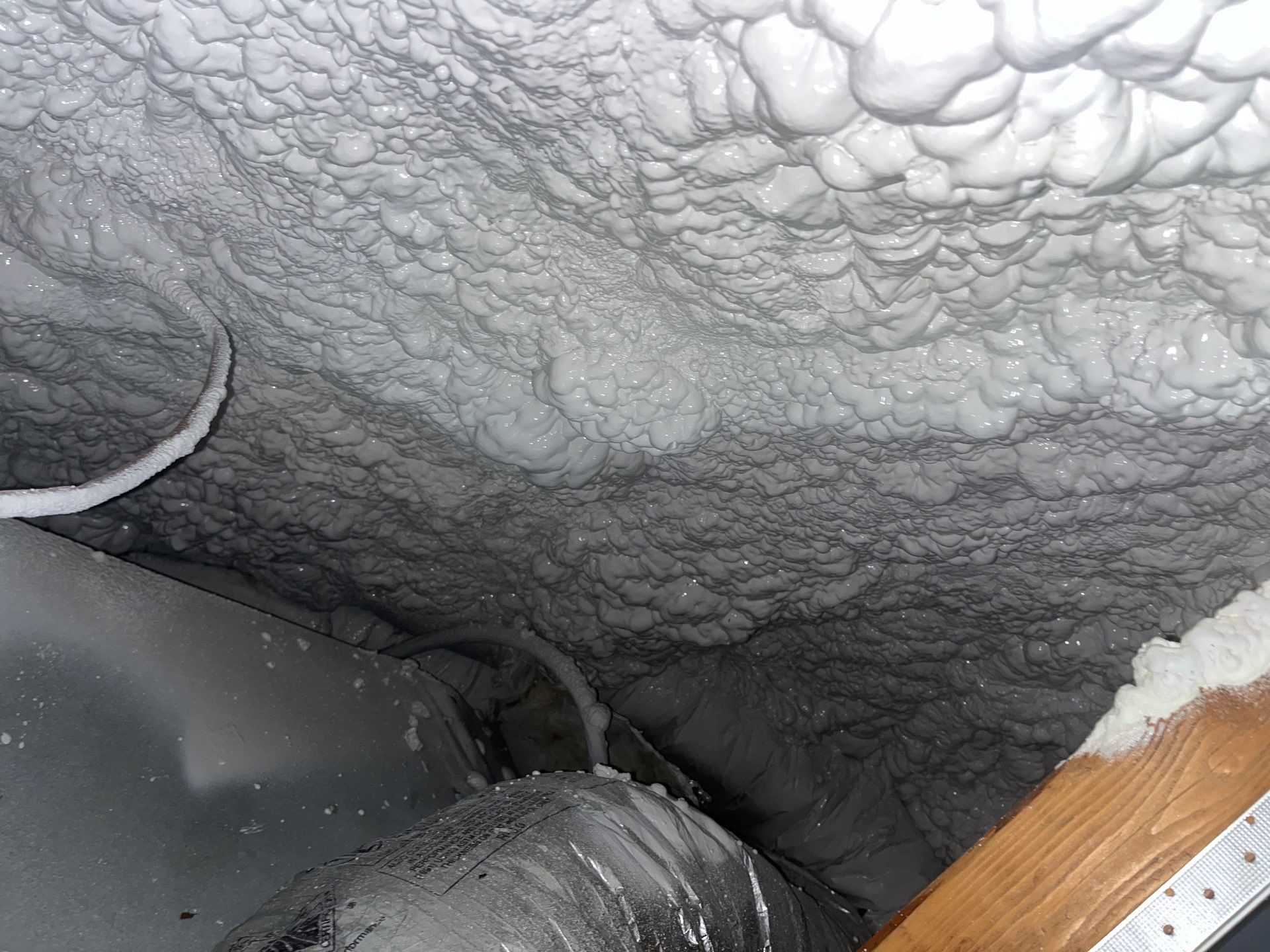Attic Insulation using open cell spray foam by NYS Foam & Energy