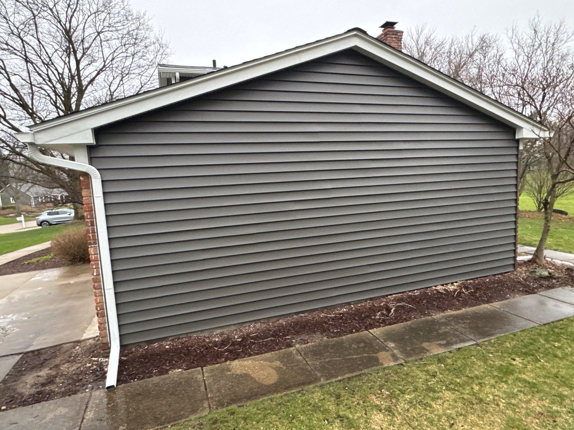 Siding Replacement using Alside Charcoal Smoke and Roof Replacement using Owens Corning Peppercorn by 180 Contractors