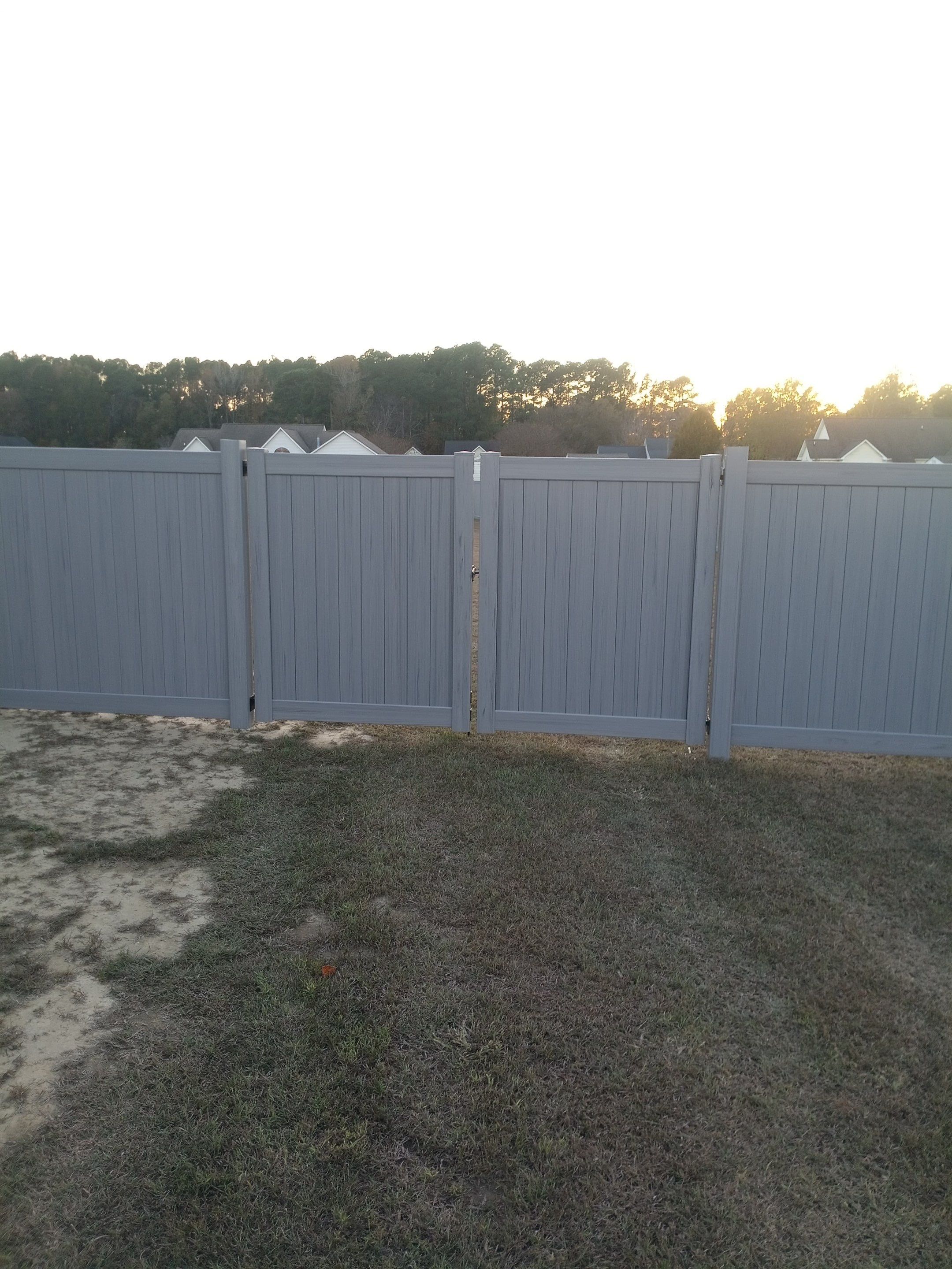 Gray Vinyl Project in Grimesland NC by Superior Fence and Rail