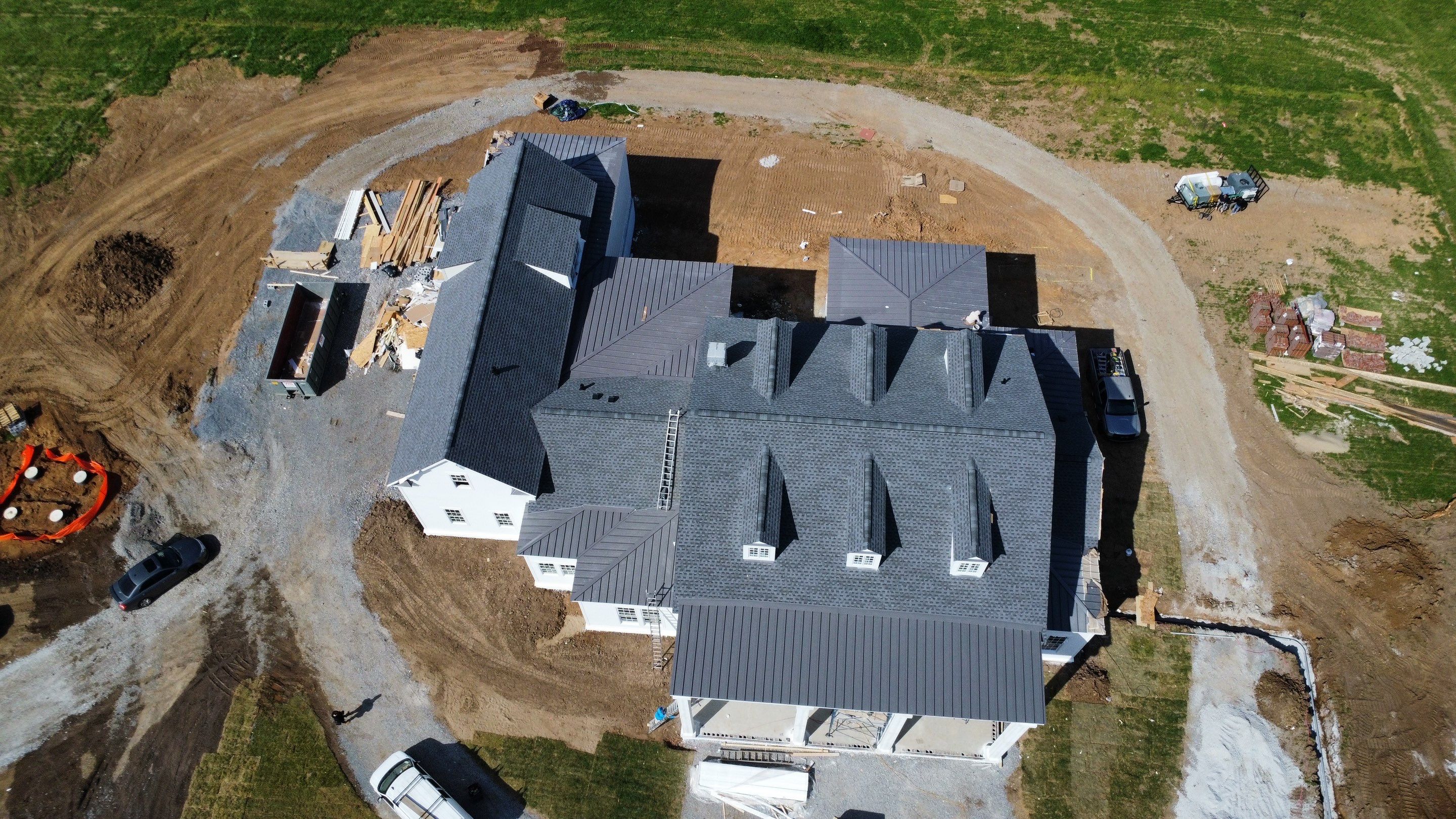 Residential Roof Install - Shingles and Standing Seam Metal by Undersun Roofing 