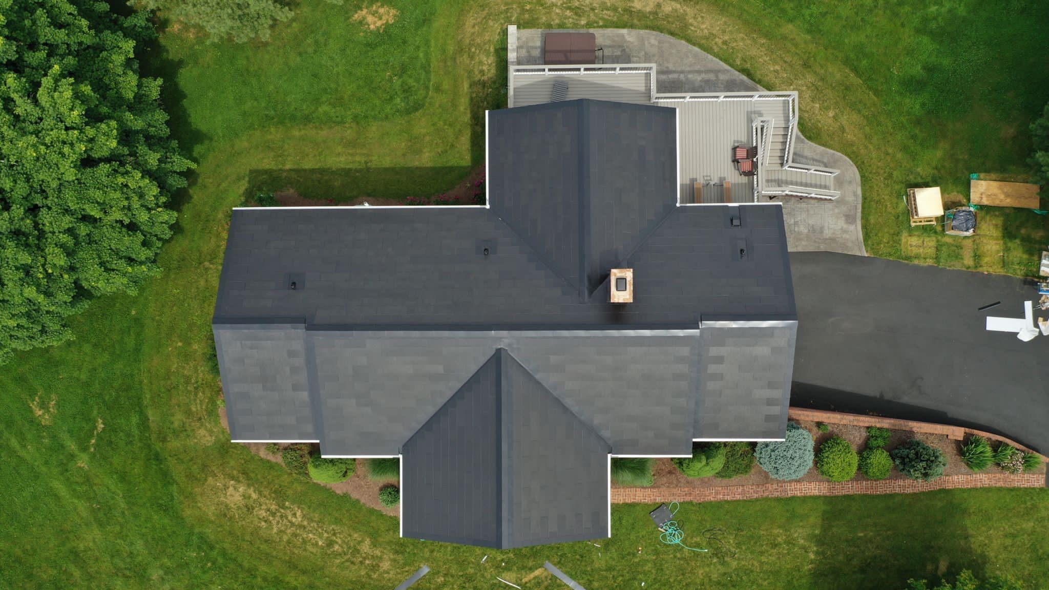 Tesla Solar Roof Installation by American Home Contractors