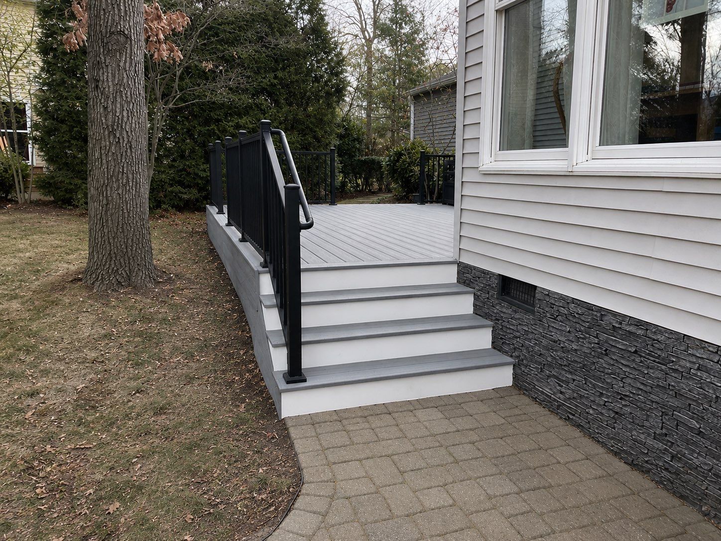 Trex Deck Resurfacing & New Railing in Sterling, VA by Sunburst Construction Inc