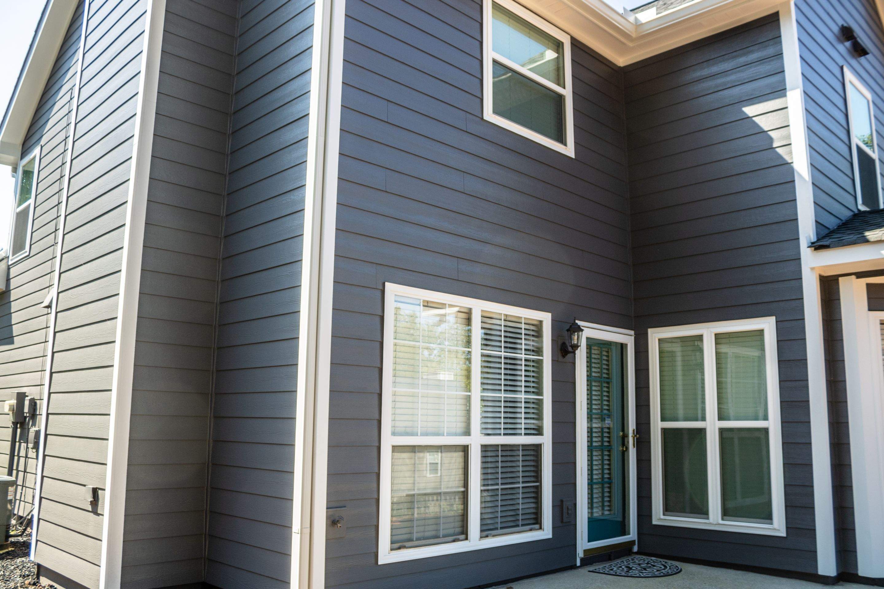 Lawrenceville, GA Full Siding Replacement, Exterior Painting, and Window Installation by Nelson Exteriors 