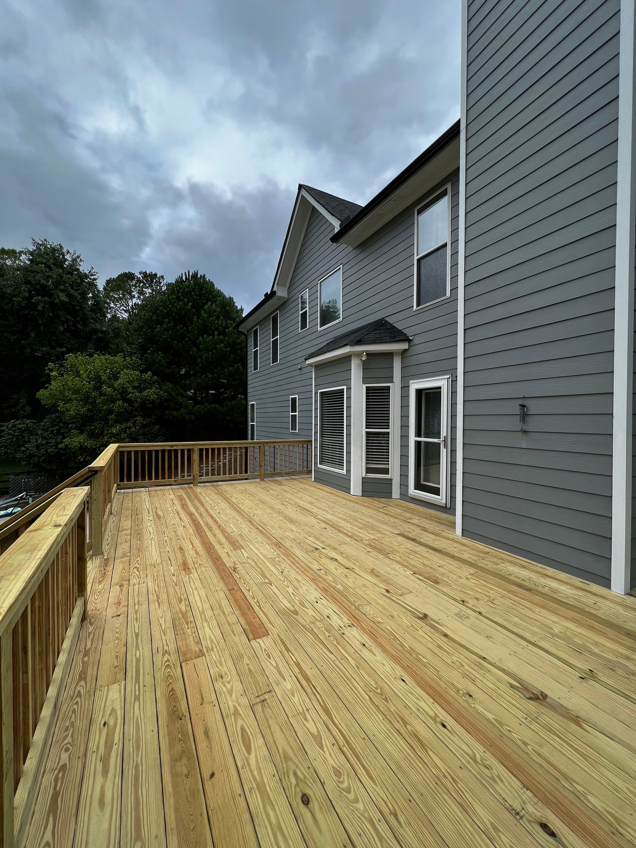 Elevated Pressure-Treated Wood Deck Replacement in Cartersville Georgia by Swift Home Renovations