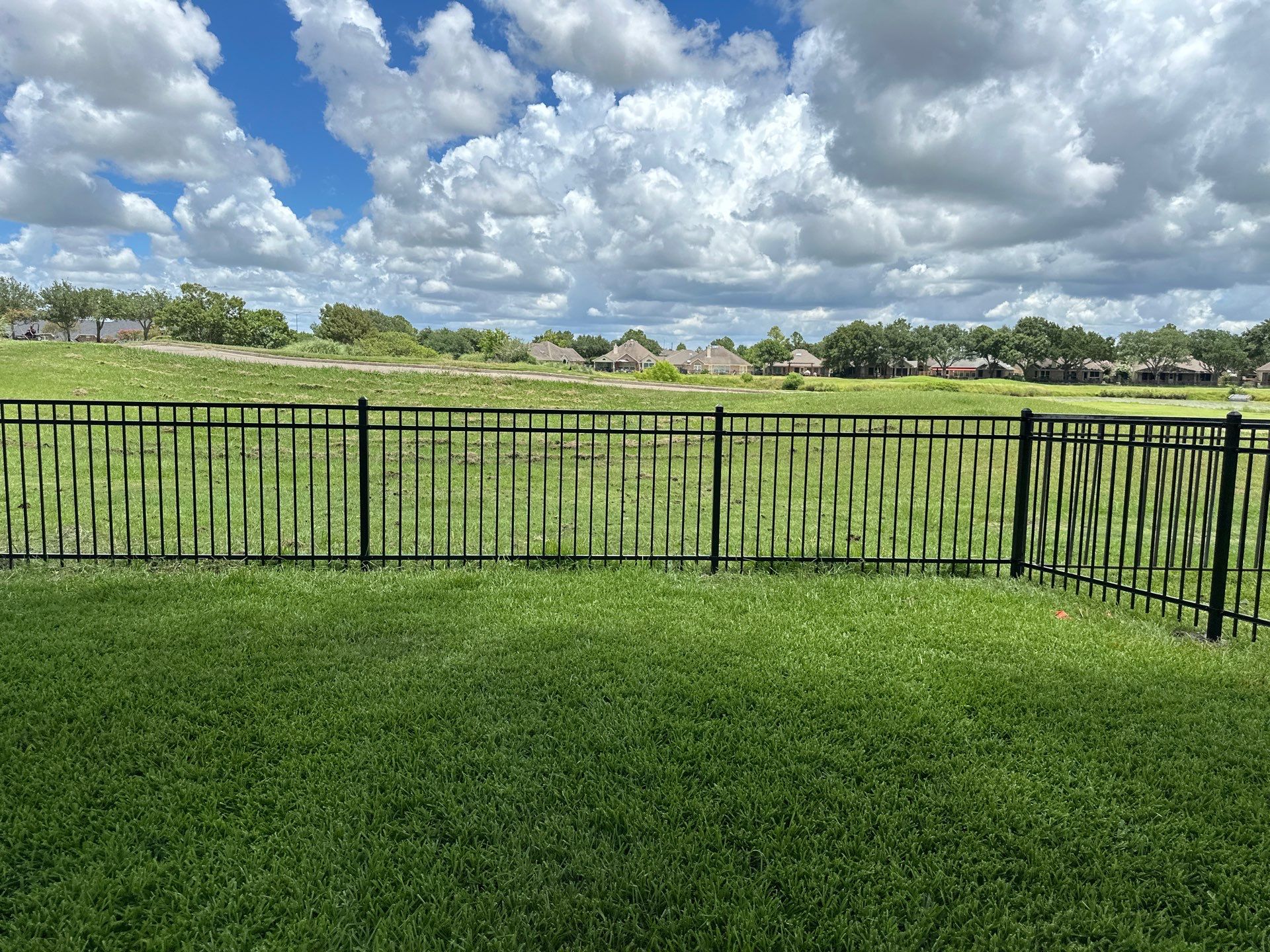 Stunning iron installation in Pearland by Tim's Fences