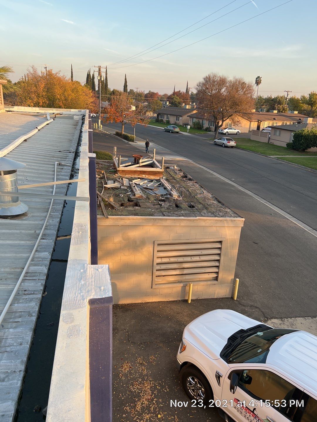 Metal roof restoration on commercial roof using Conklin Benchmark/ PUMA XL acrylic coatings over metal and foam by Straight Edge Roofing Inc