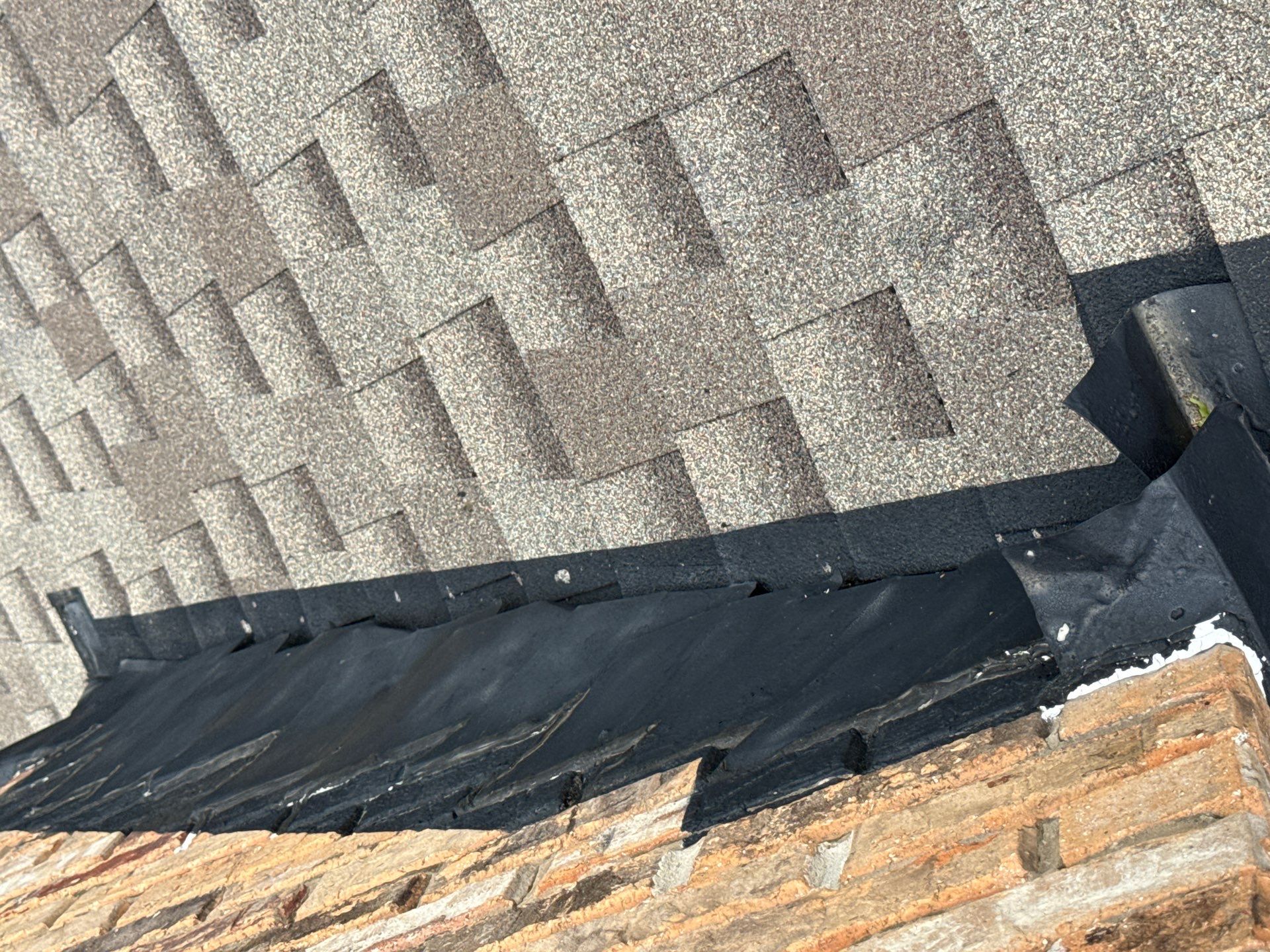 Cricket and Flashing Repair  by Rhino Roofing and General Contracting, LLC
