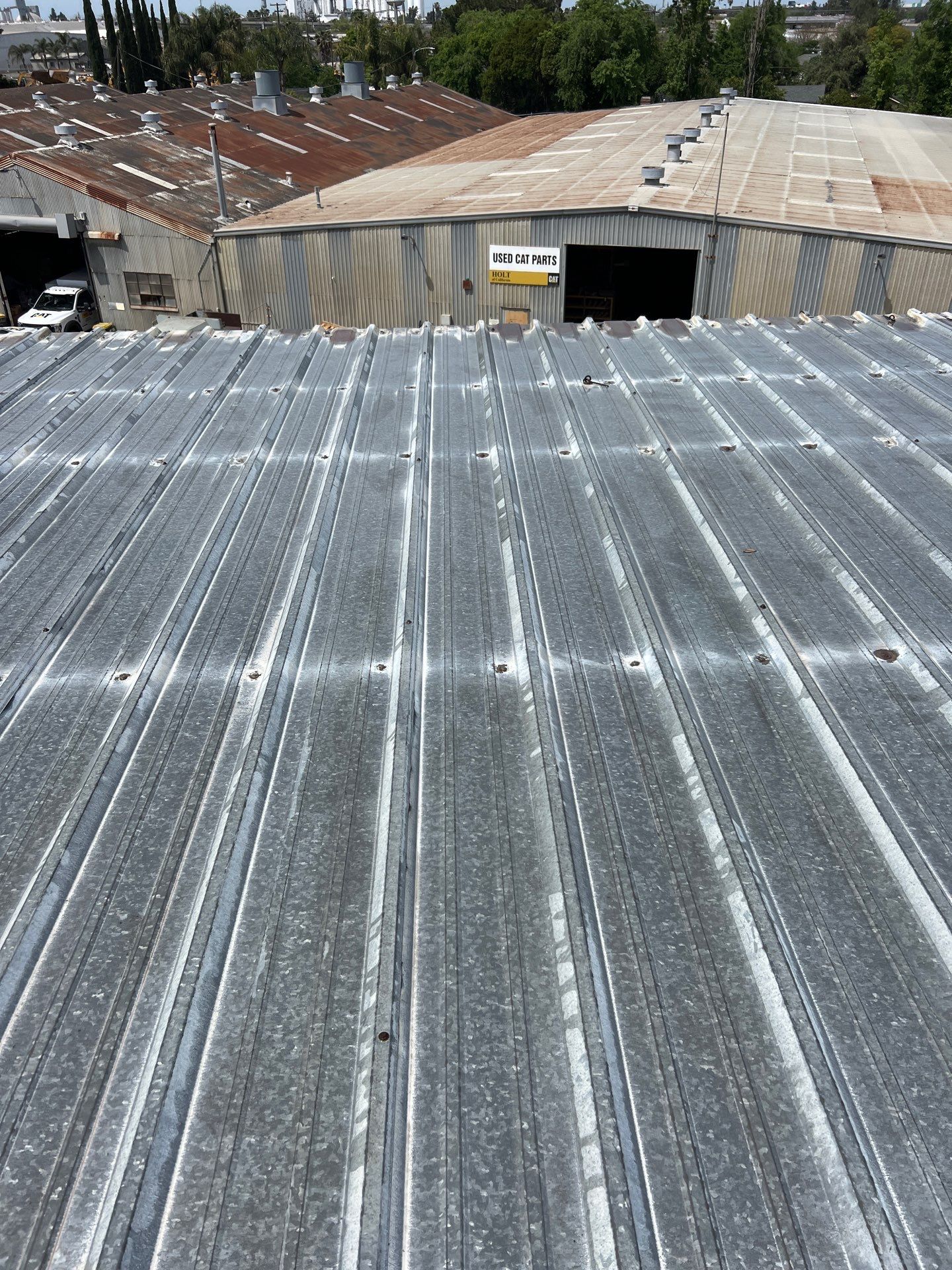 MR Roofing system using Conklin BenchPly system with PUMA top coat by Straight Edge Roofing Inc