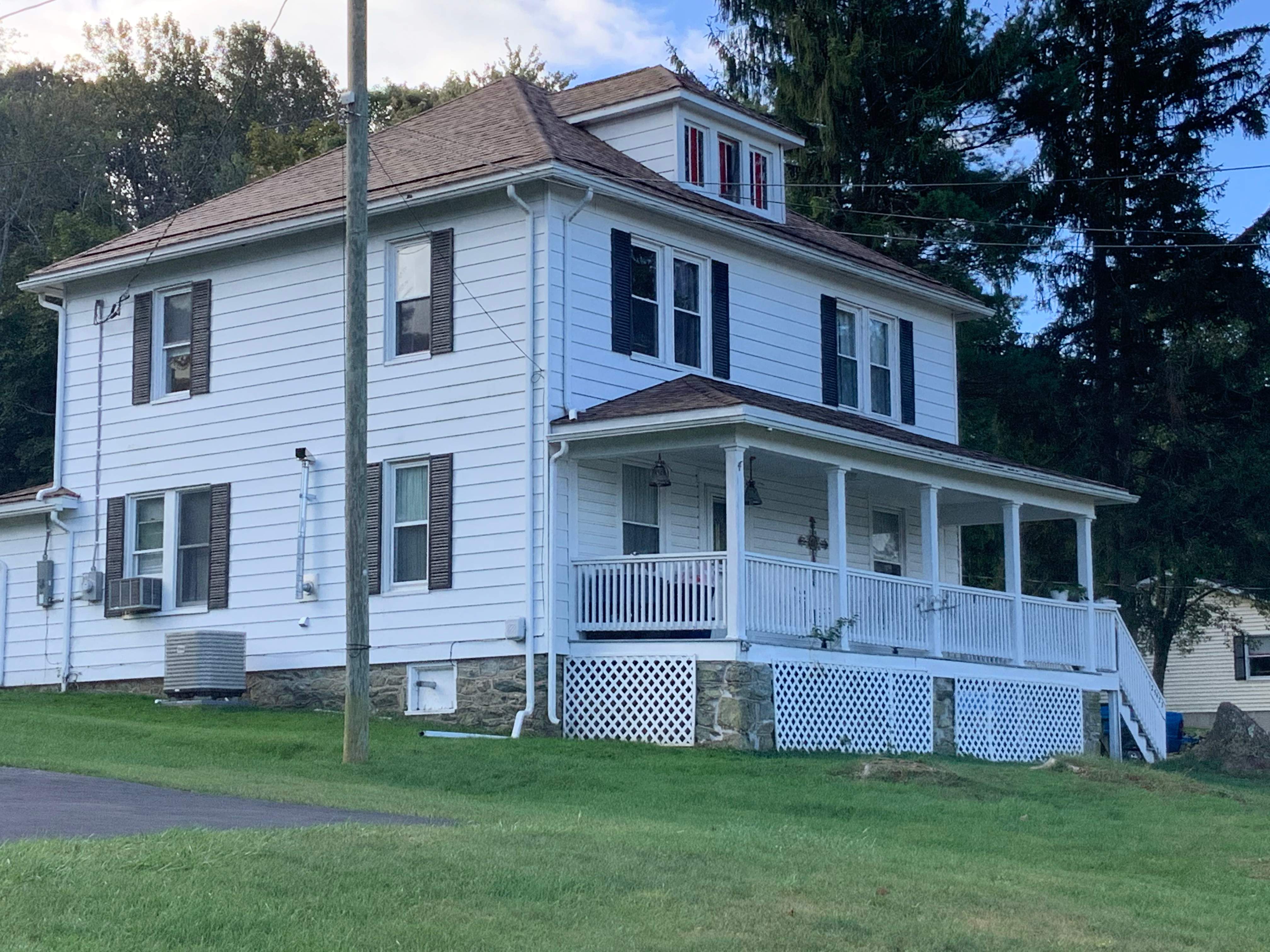Residential Roofing Installation using Max Def Resawn Shake by Alpha Design Services