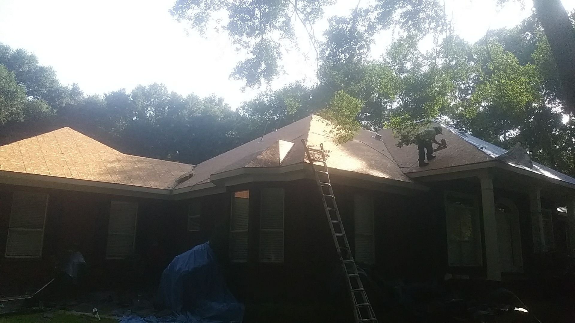 Residential Roofing Installation using Metal roofing by American Roofing & Construction LLC