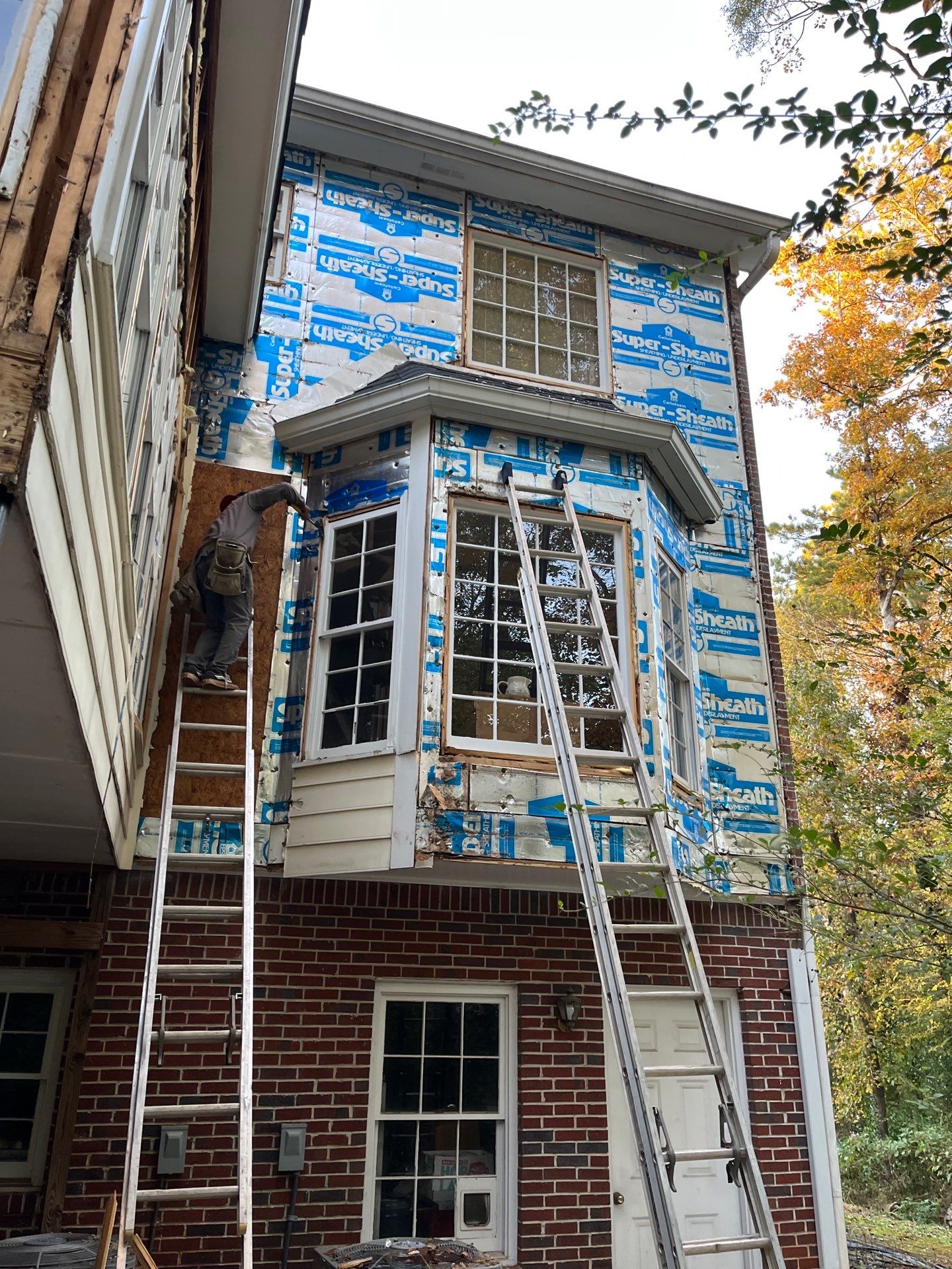 53 Window Replacements with Master 2800 Series Vinyl Replacement Windows and James Hardie Siding Installation by Nelson Exteriors 