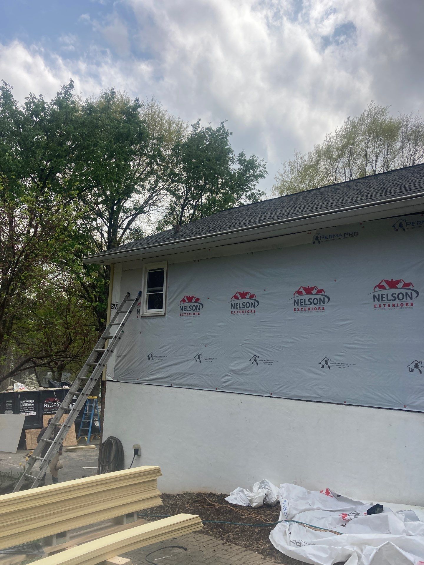 Window, Siding, & Rotten Wood Replacement with Exterior Painting in Woodstock, GA by Nelson Exteriors 