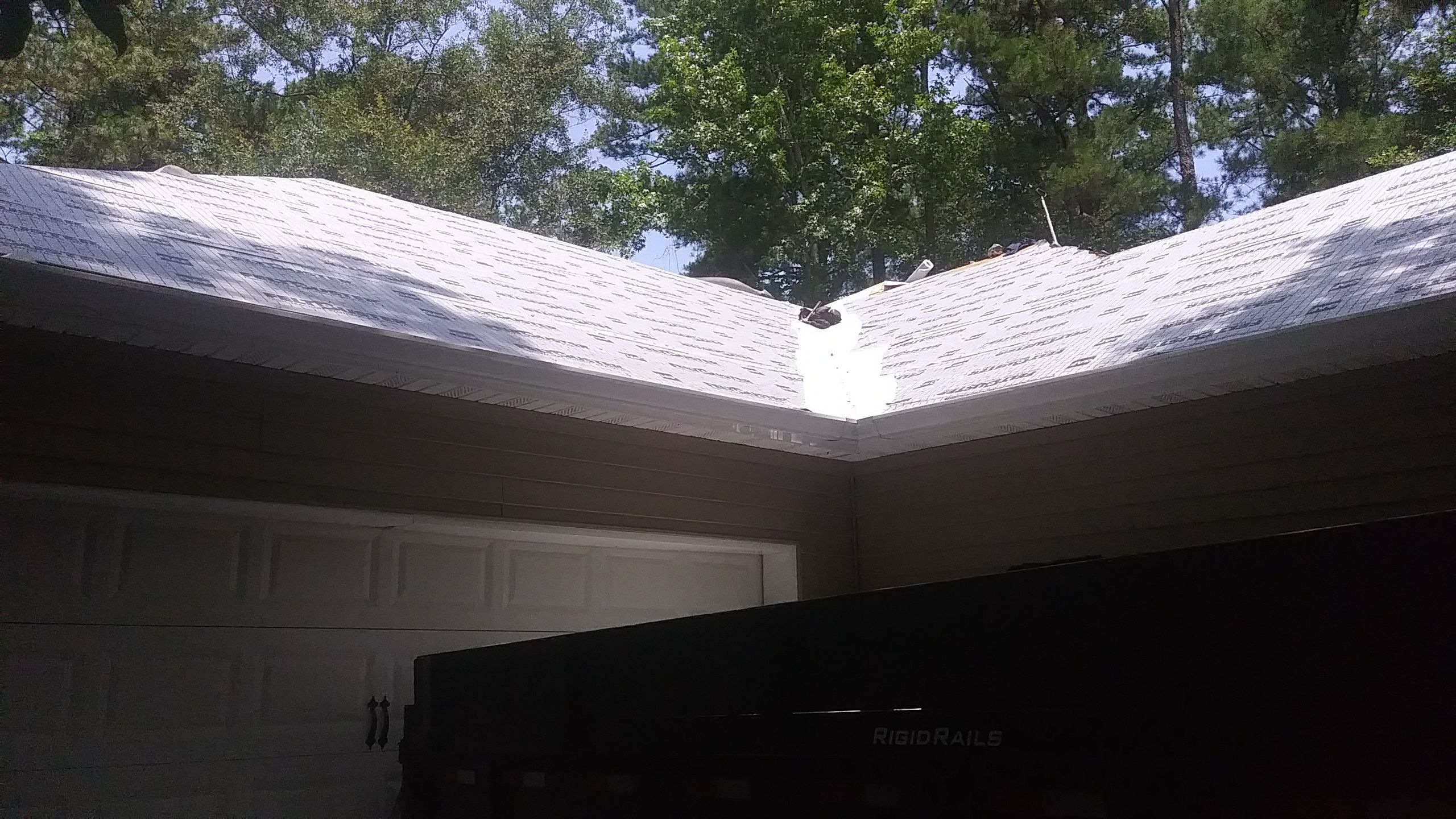 Residential Roofing Installation using Roof Replacement by American Roofing & Construction LLC