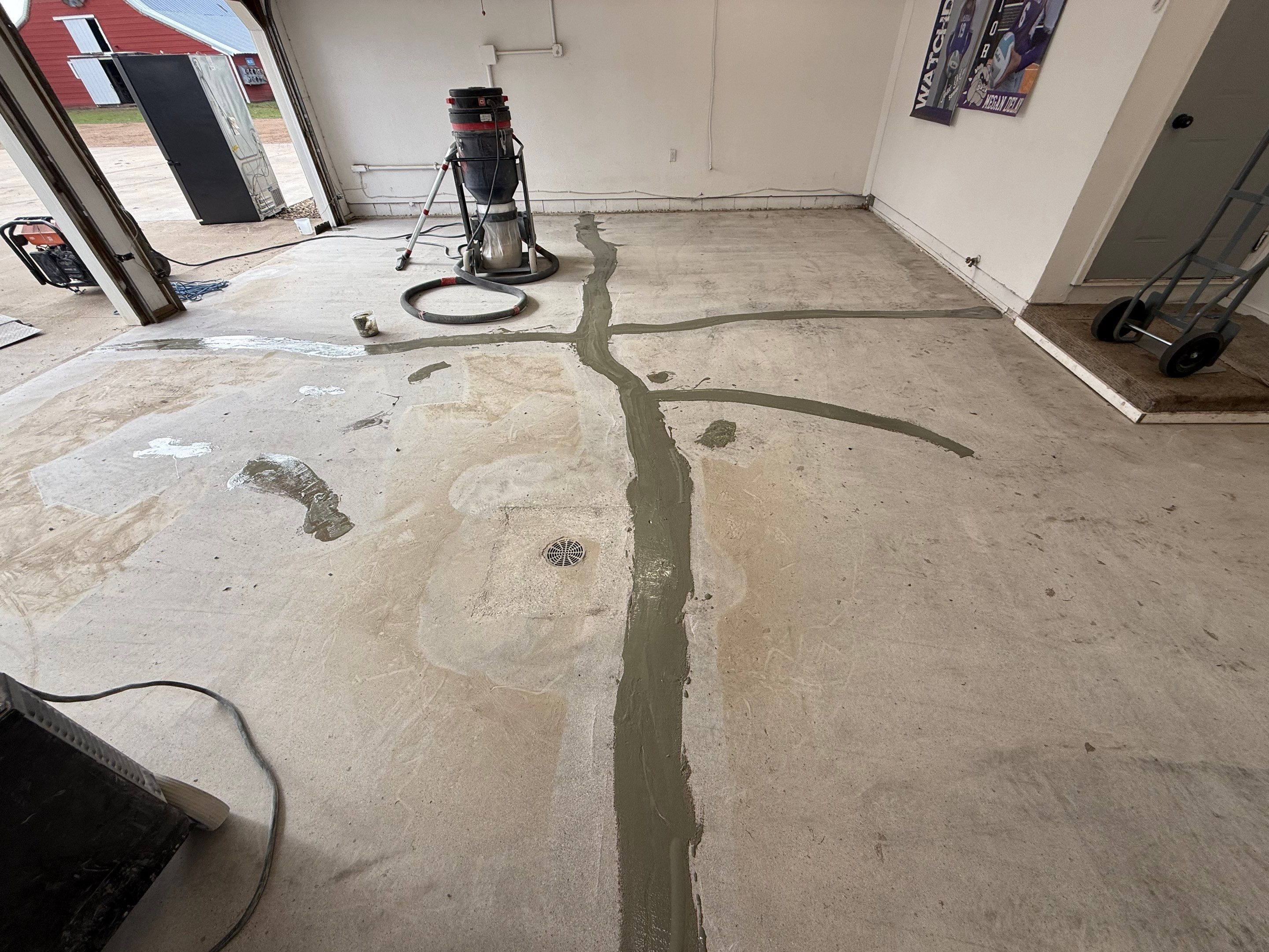Feather Grey Garage Floor Coating and Crack Repair in Beresford by Select Painting, Coatings & Garage Cabinets