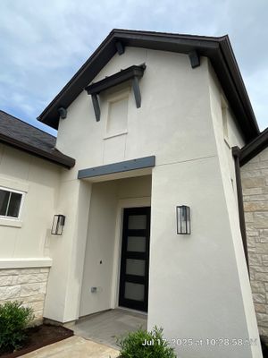 Magnolia Craftsmanship: Stucco and Foam Accents with Stone Integration